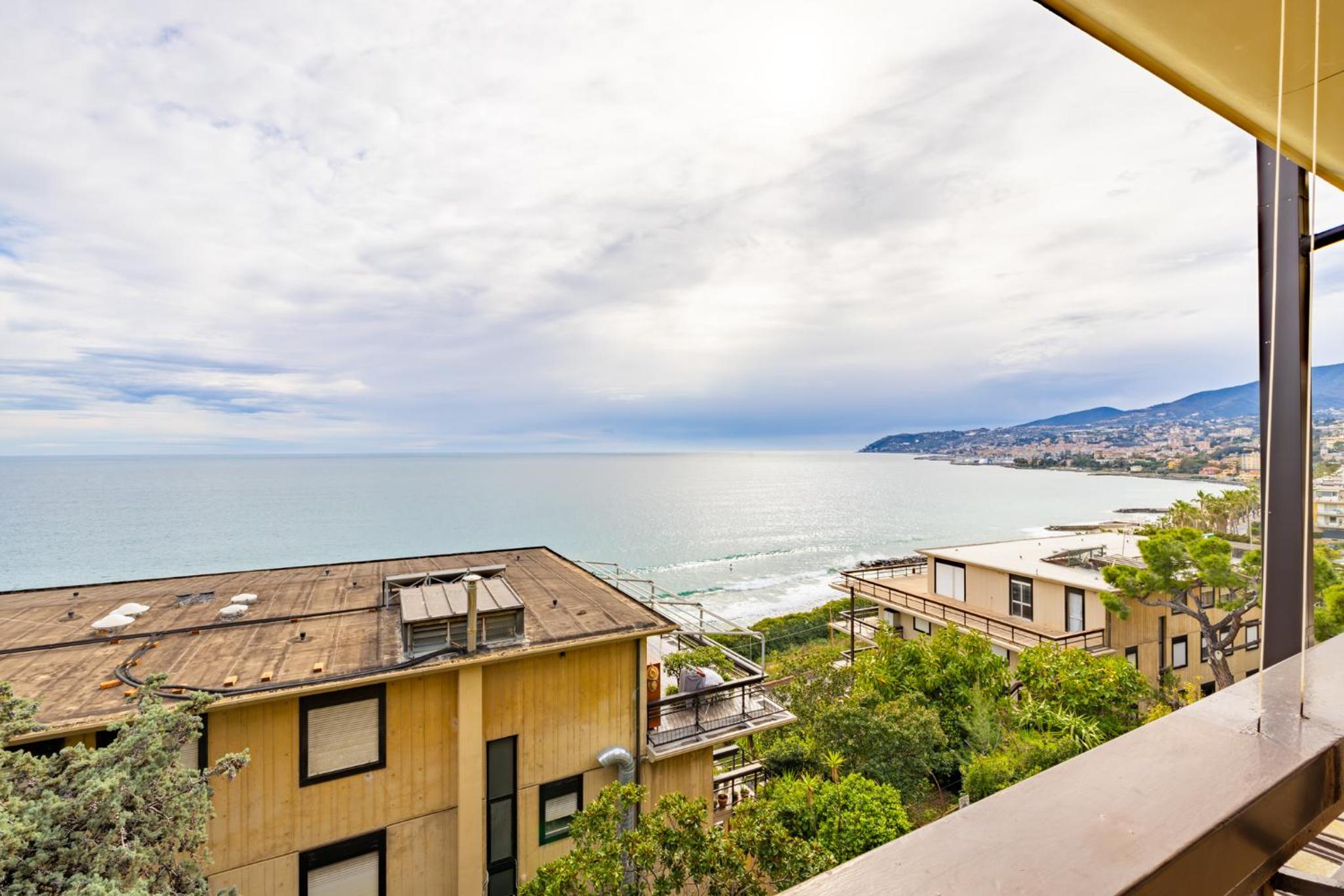 Mina House - Appartamento Fronte Mare con Ampia Terrazza e Garage