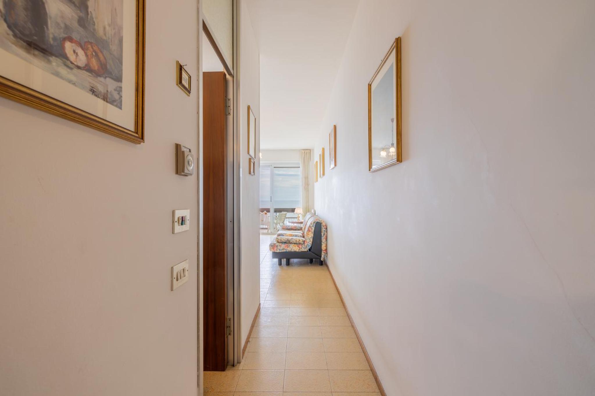 Mina House - Appartamento Fronte Mare con Ampia Terrazza e Garage