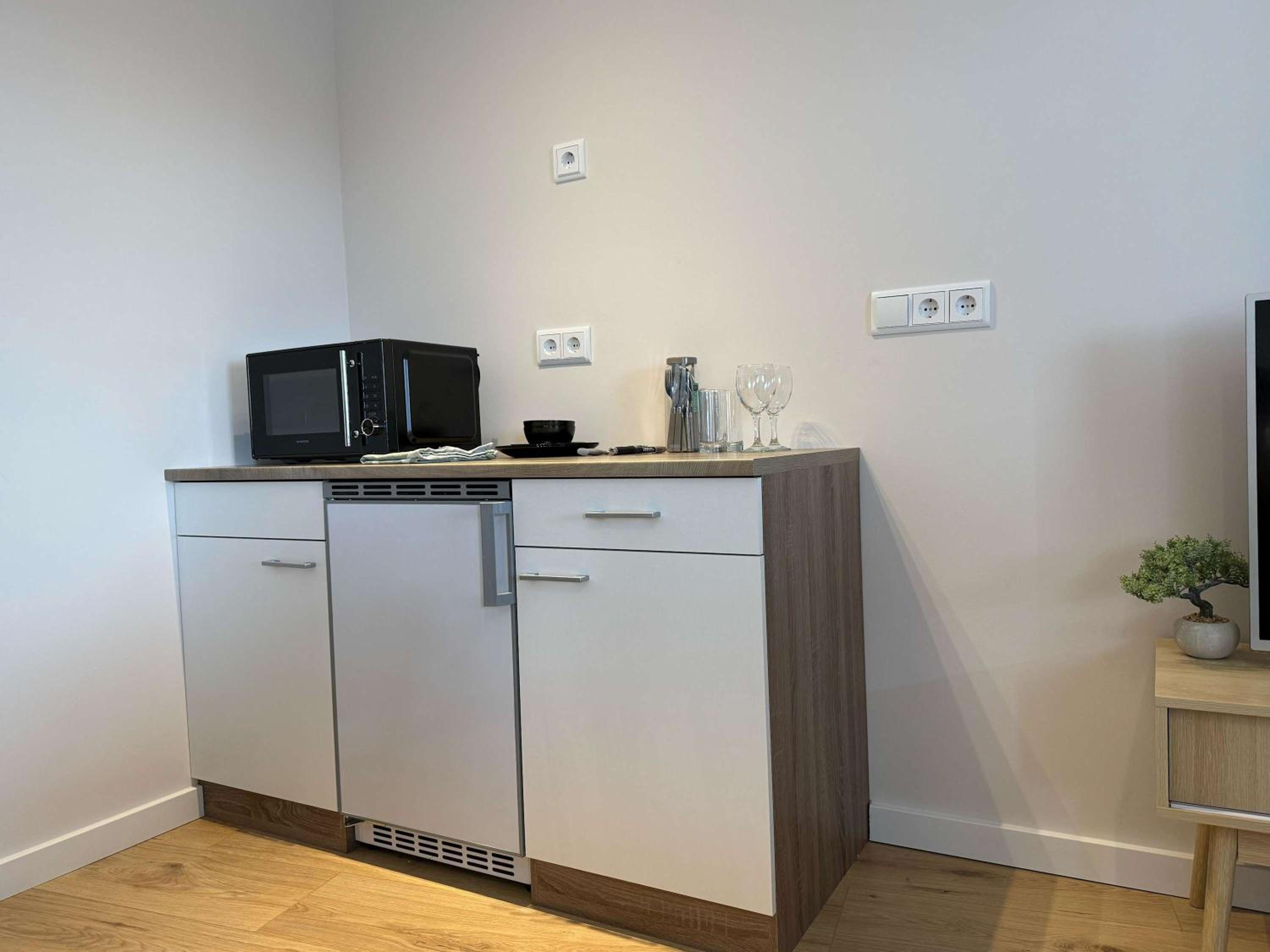 The Cozy Nest Stylish and Serene City Studio