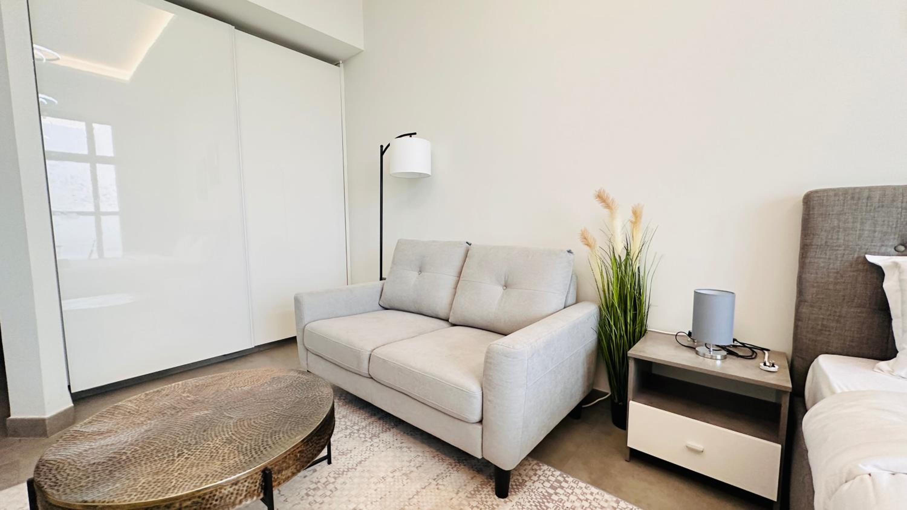 Upscale Apartment at Oval Tower Near Downtown with Balcony and Parking by Belvilla
