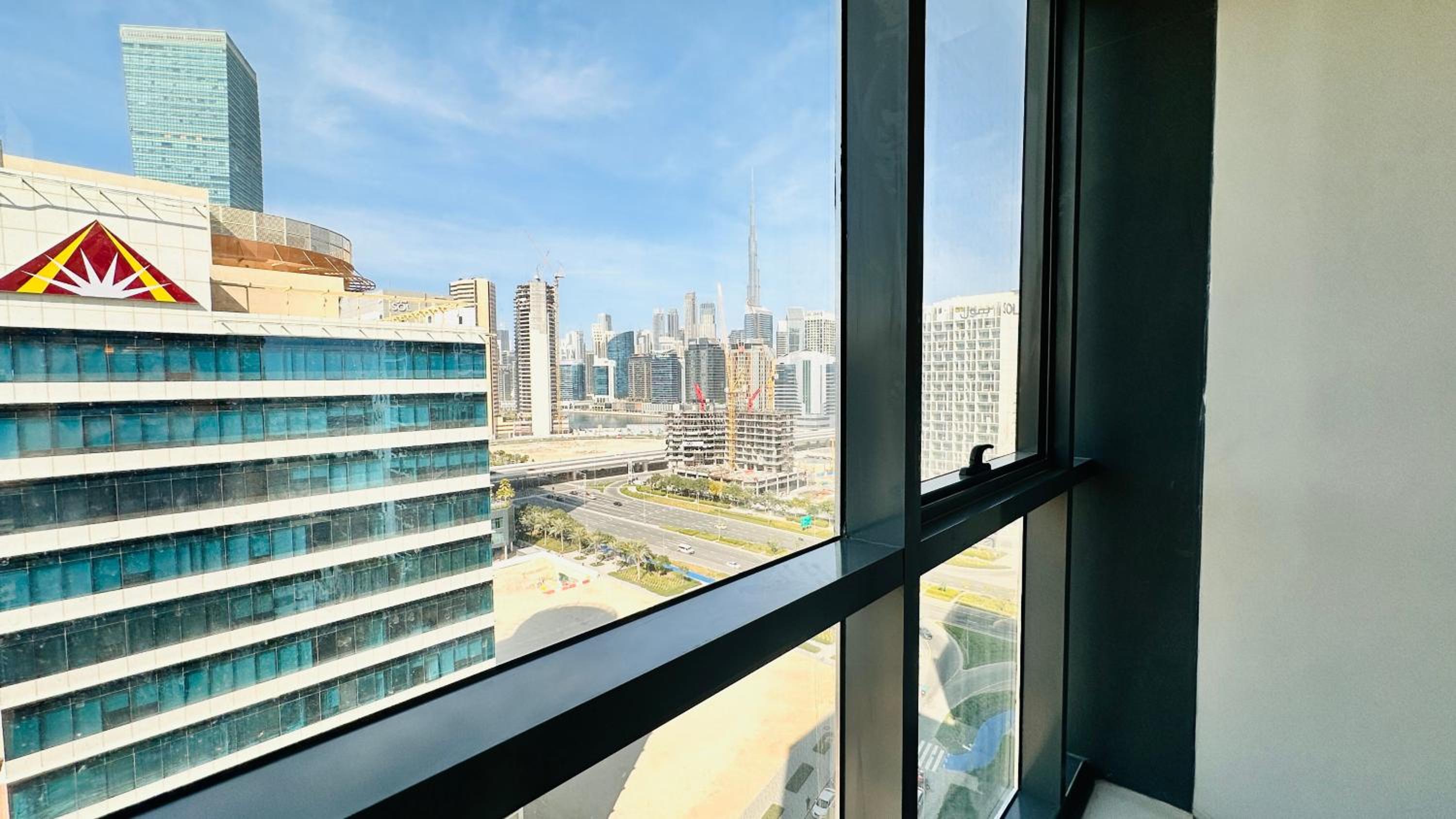 Upscale Apartment at Oval Tower Near Downtown with Balcony and Parking by Belvilla