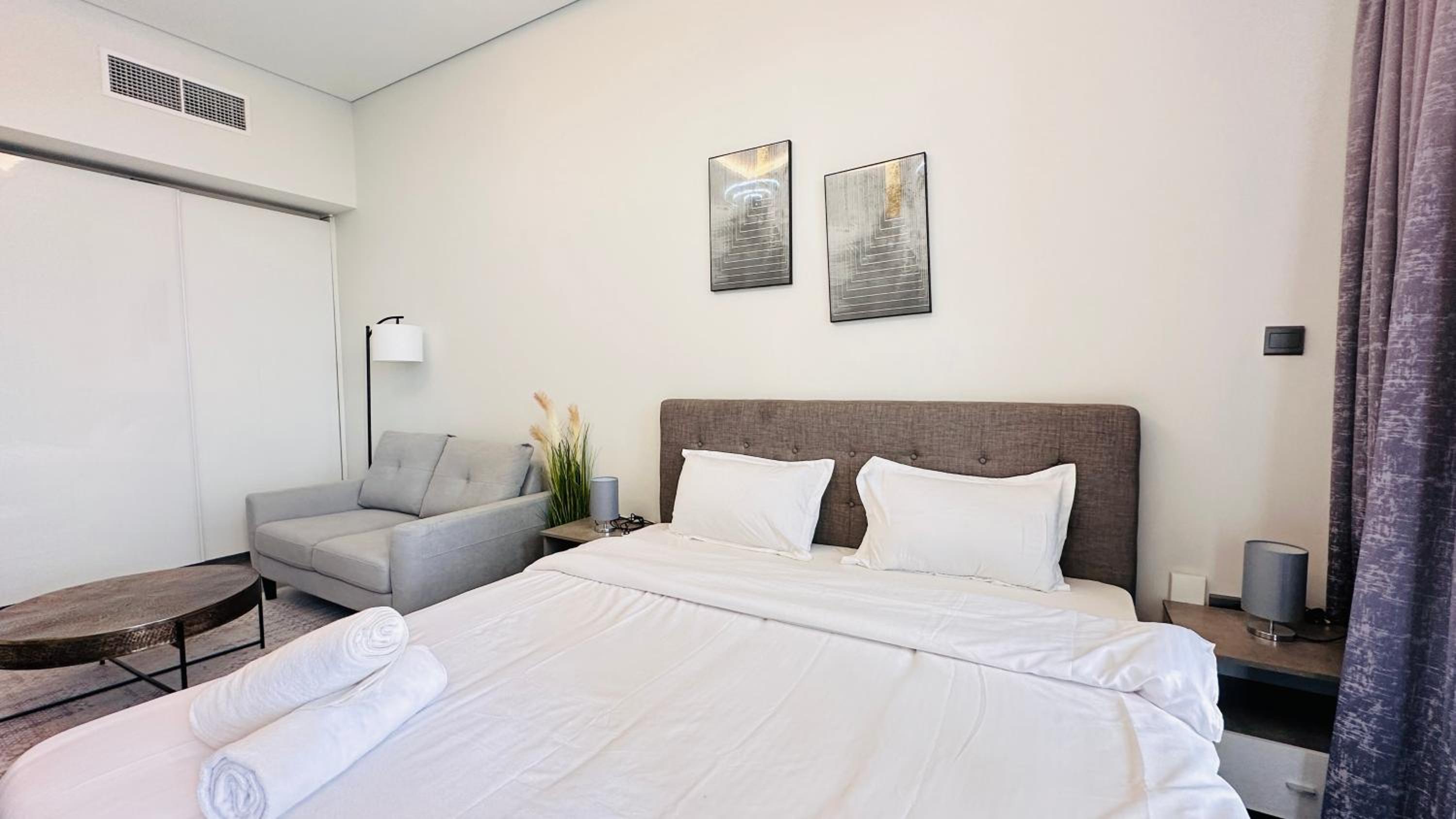 Upscale Apartment at Oval Tower Near Downtown with Balcony and Parking by Belvilla