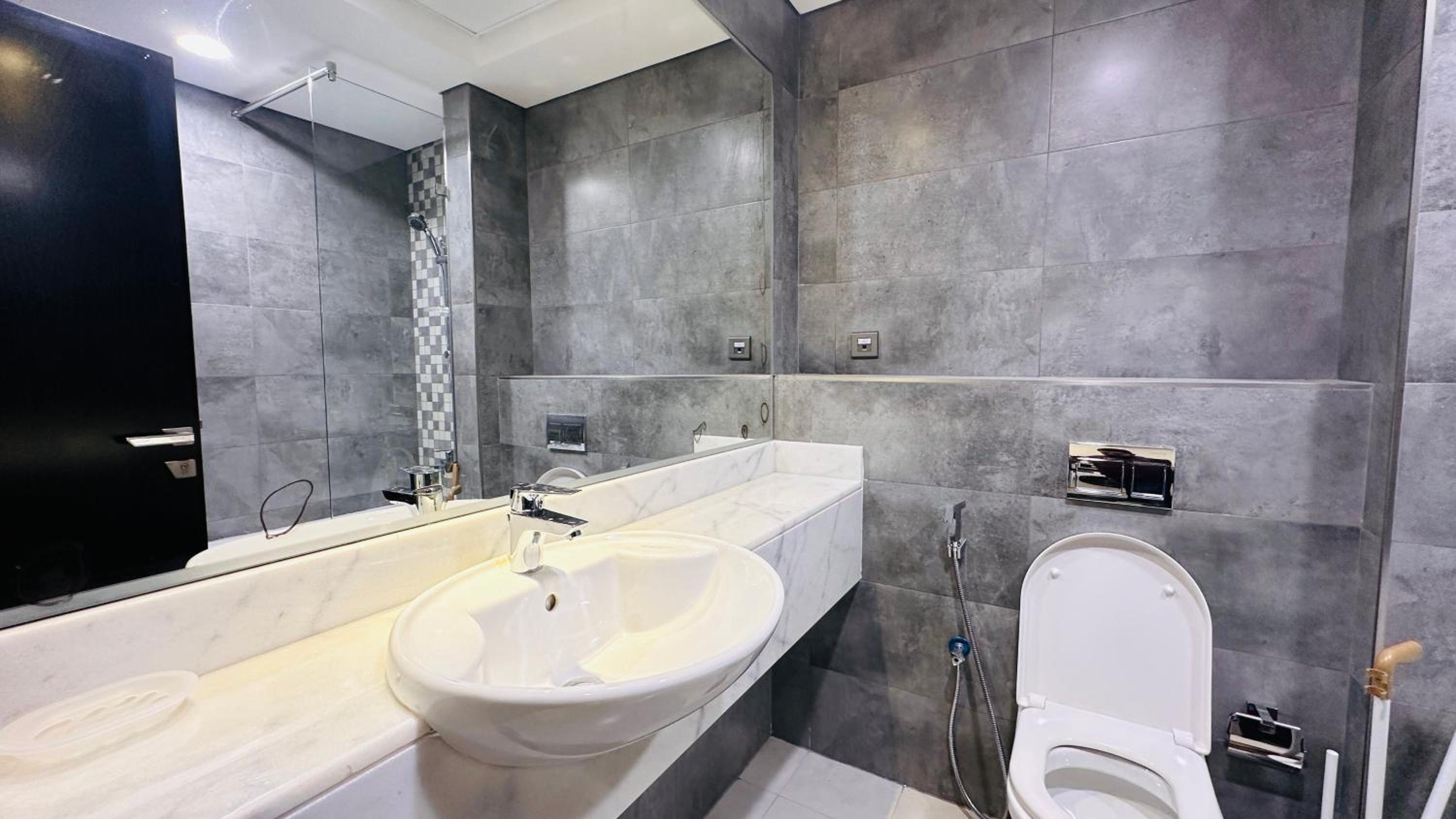 Upscale Apartment at Oval Tower Near Downtown with Balcony and Parking by Belvilla