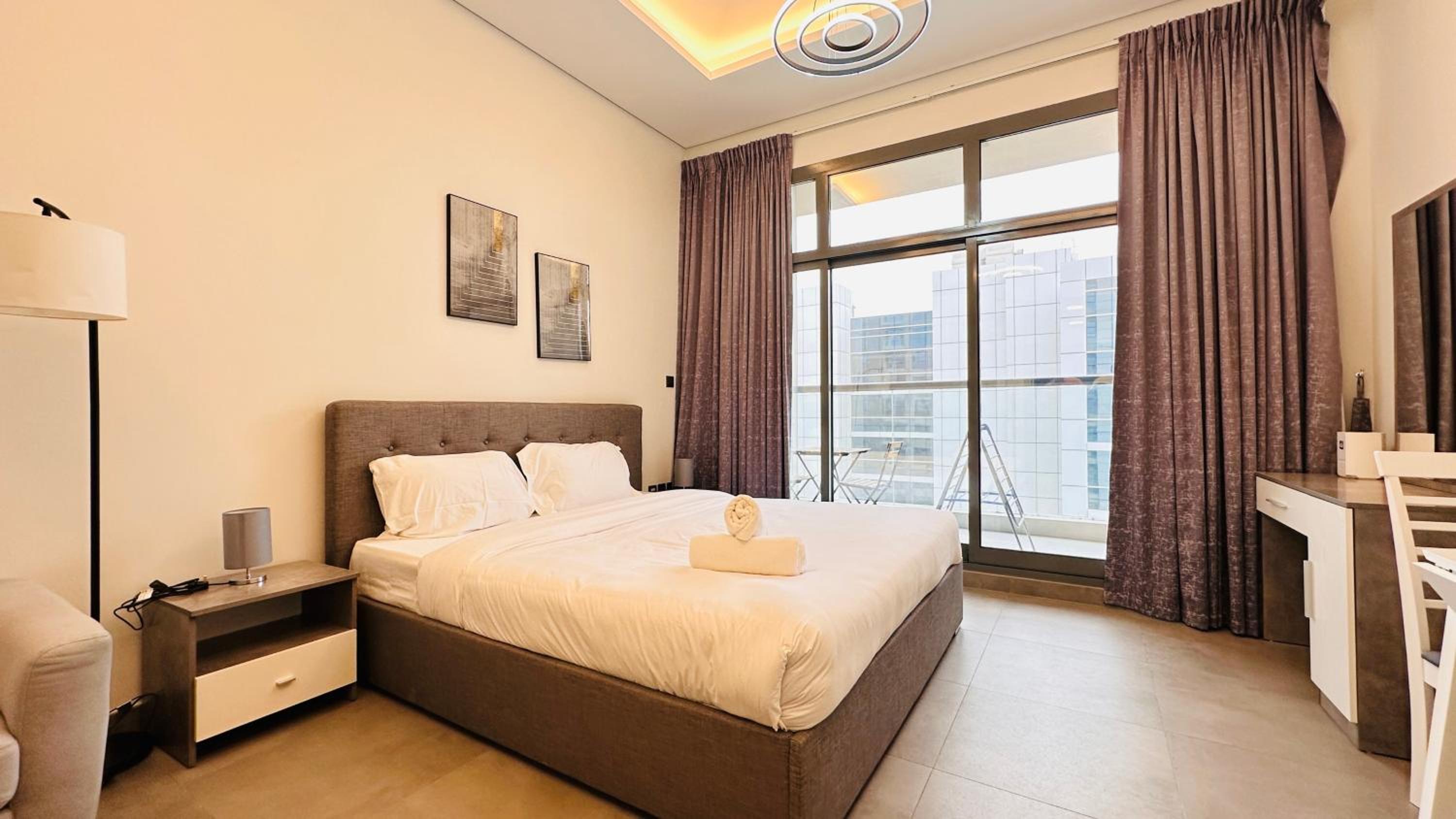 Upscale Apartment at Oval Tower Near Downtown with Balcony and Parking by Belvilla