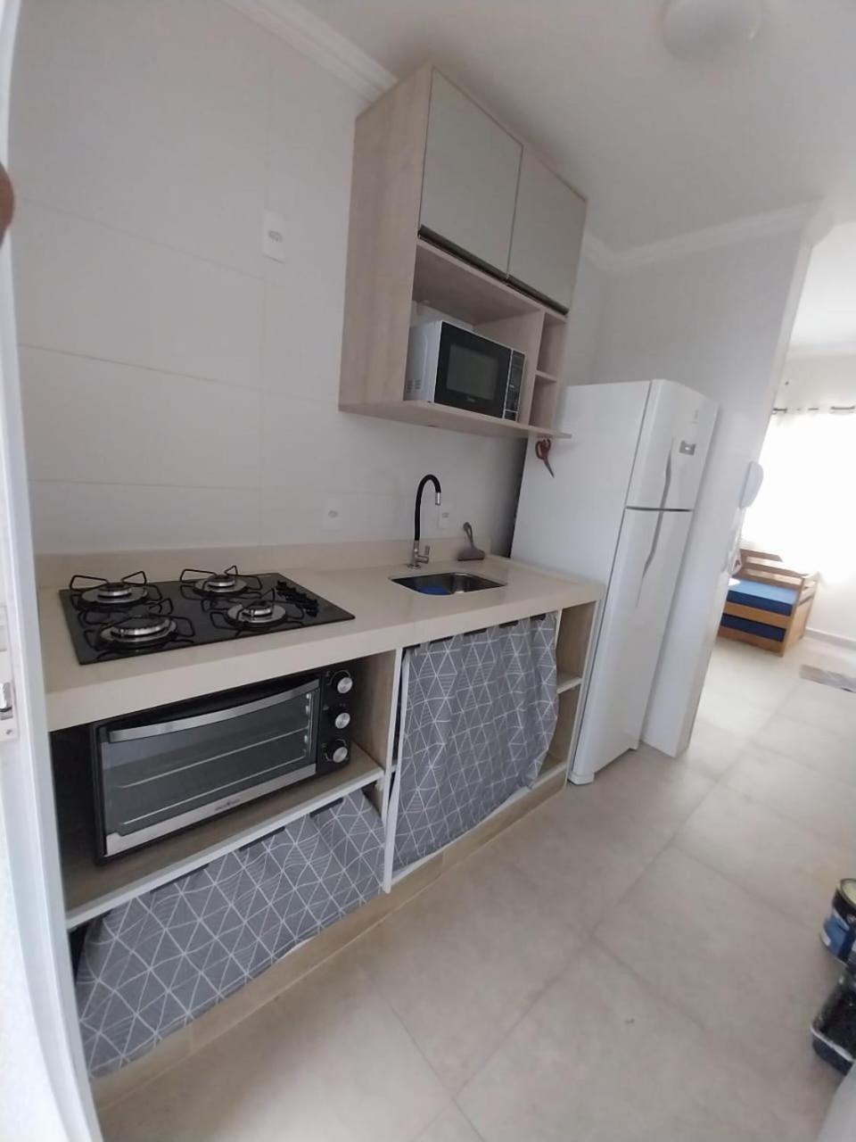 Casa em condomínio no Centro de Bertioga com Ar condicionado