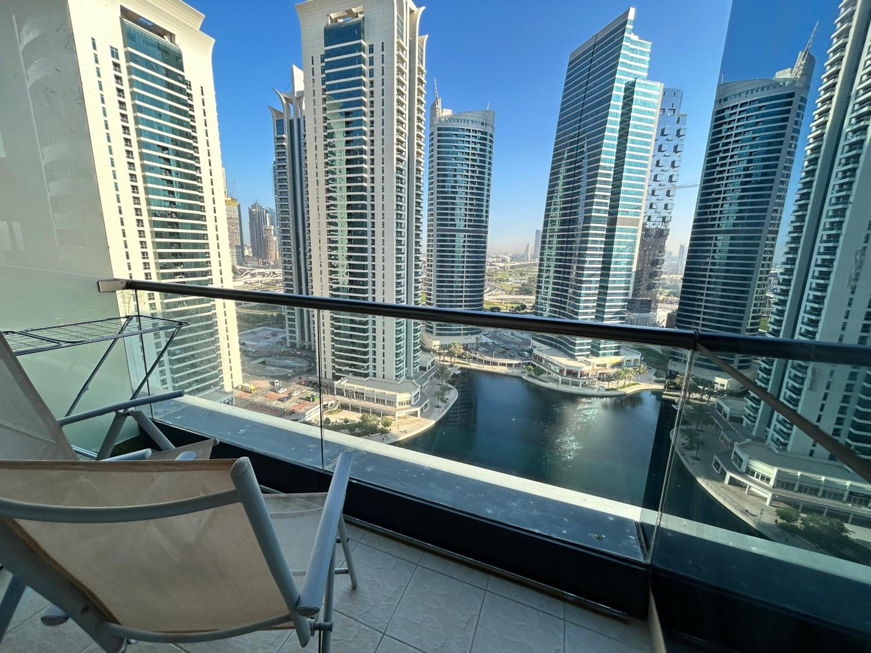 Click Stay - JLT - 2 Bedroom & Balcony Lakes view Entire Apartment -AZ