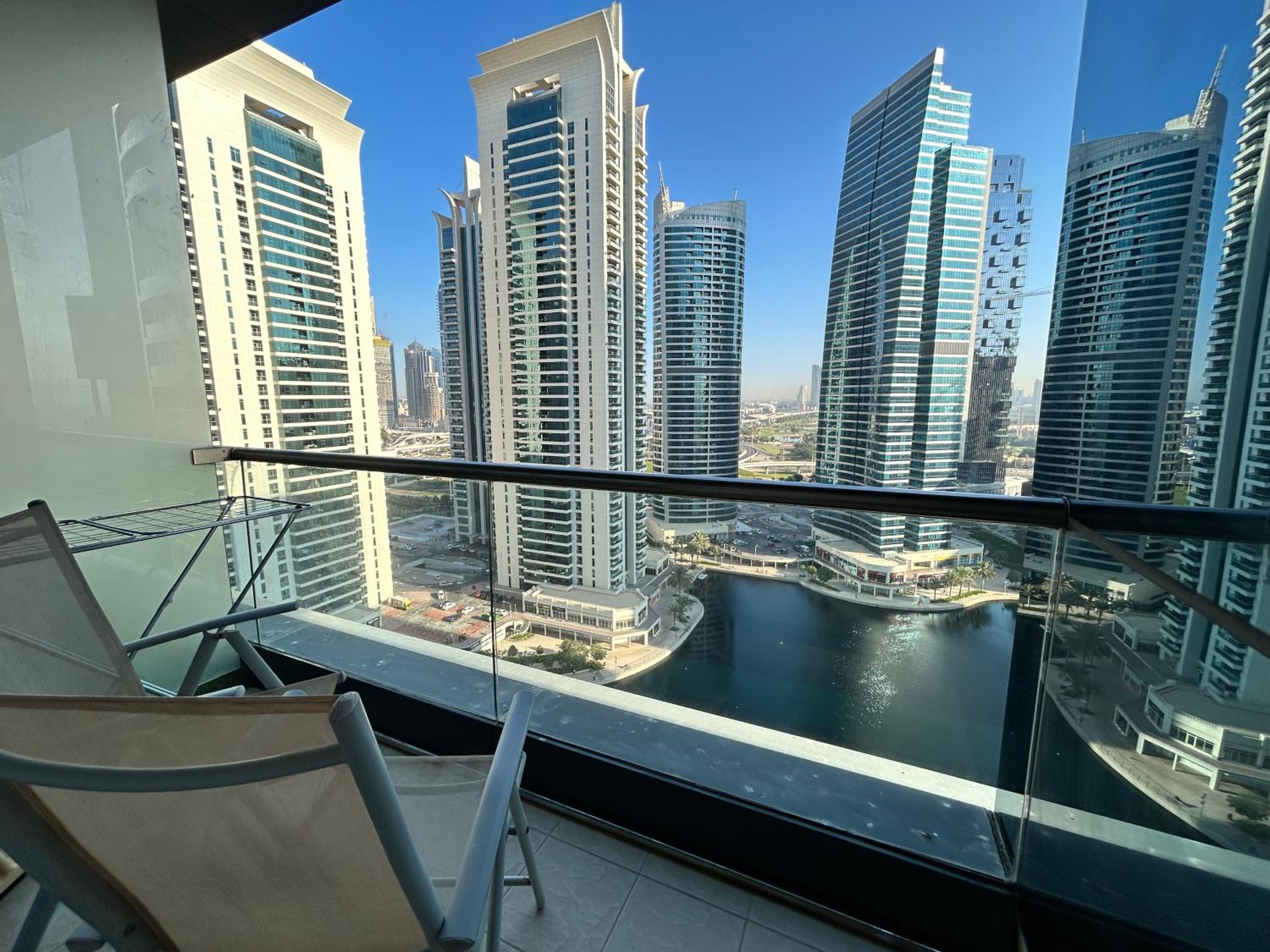 Click Stay - JLT - 2 Bedroom & Balcony Lakes view Entire Apartment -AZ