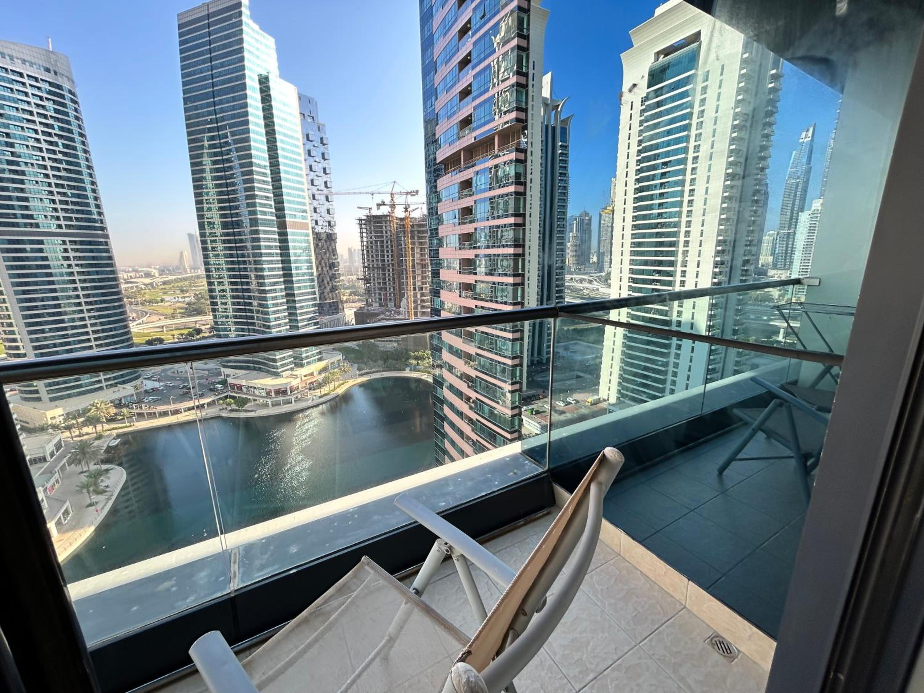 Click Stay - JLT - 2 Bedroom & Balcony Lakes view Entire Apartment -AZ