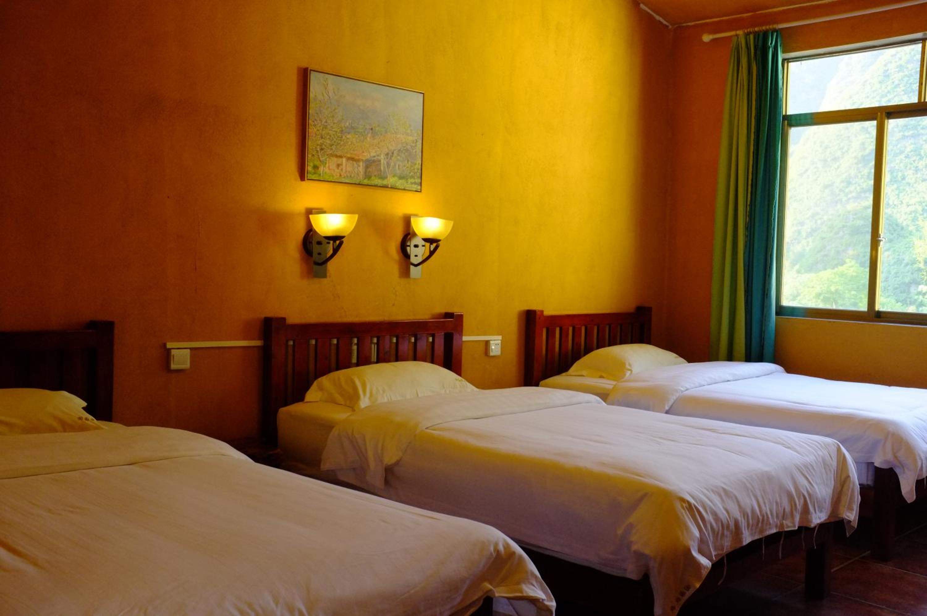 Yangshuo Eden's Social Guesthouse - Wake up to a hearty Western breakfast & fresh craft coffee & night beers & outdoor activities