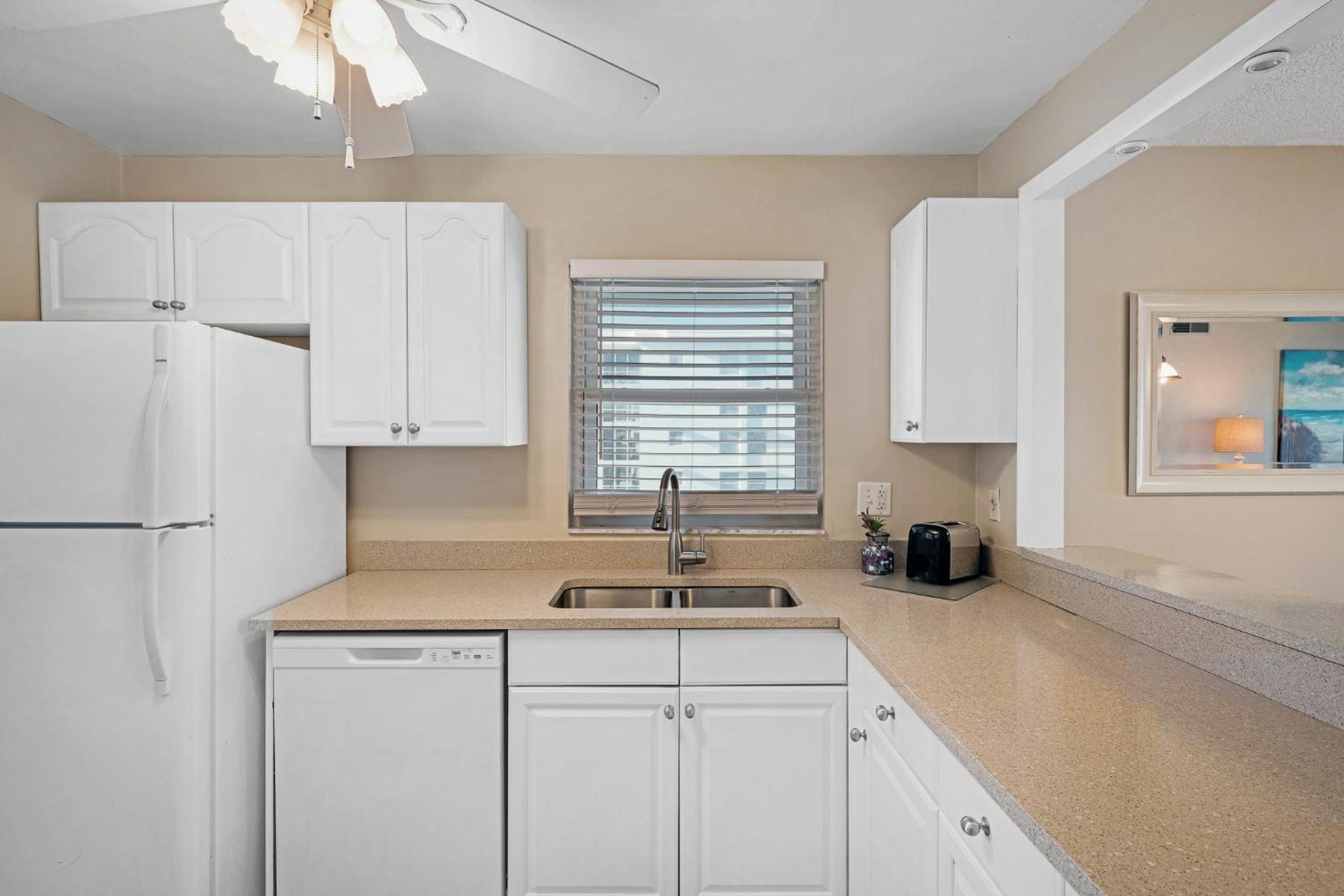 Marvel at the spectacular views from this bright corner condo!