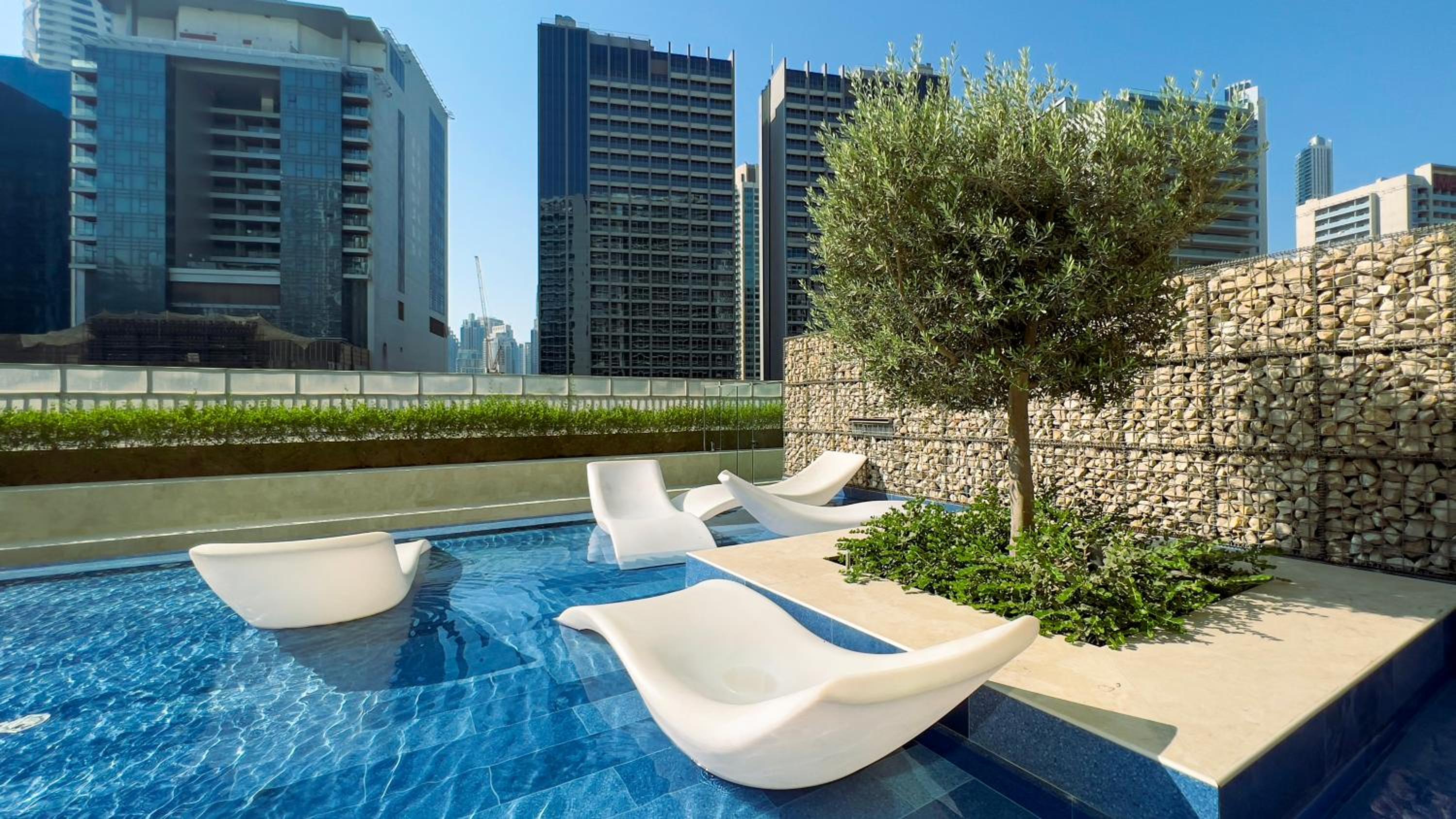 KeyRock Living - Chic Reva 1BR with Pool Access