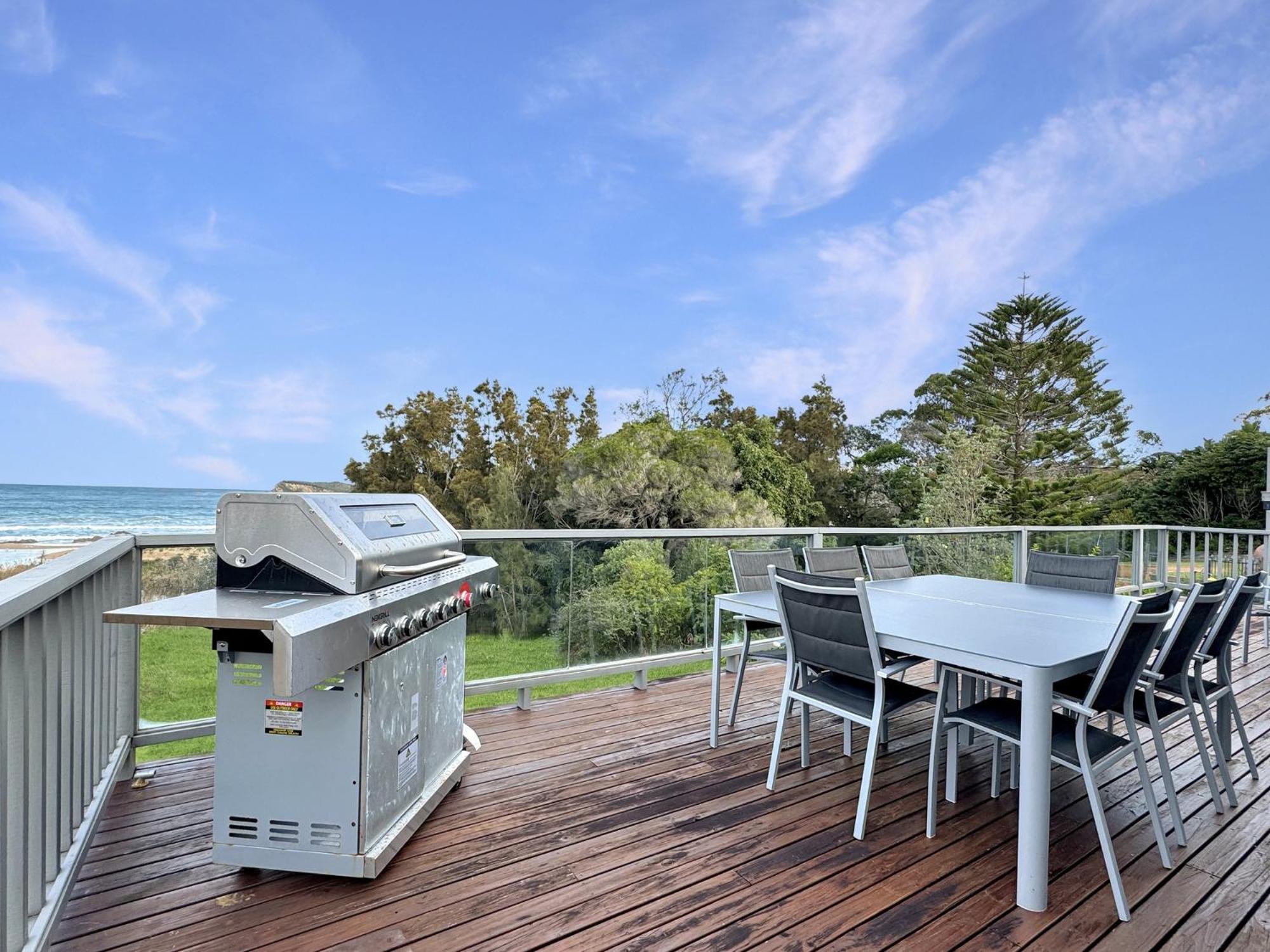 Oceanfront 4-Bed Haven with BBQ & Alfresco Dining