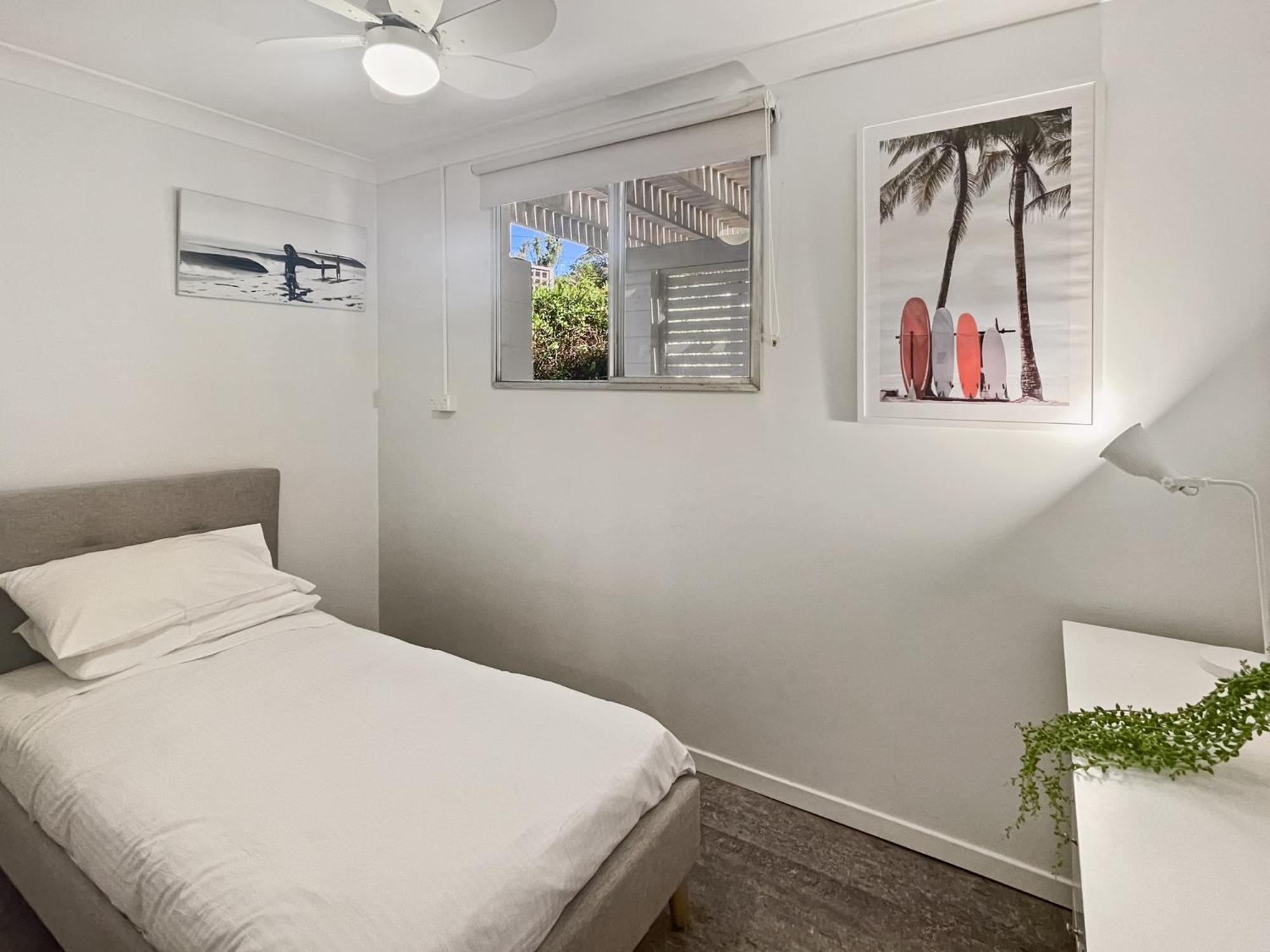 Oceanfront 4-Bed Haven with BBQ & Alfresco Dining