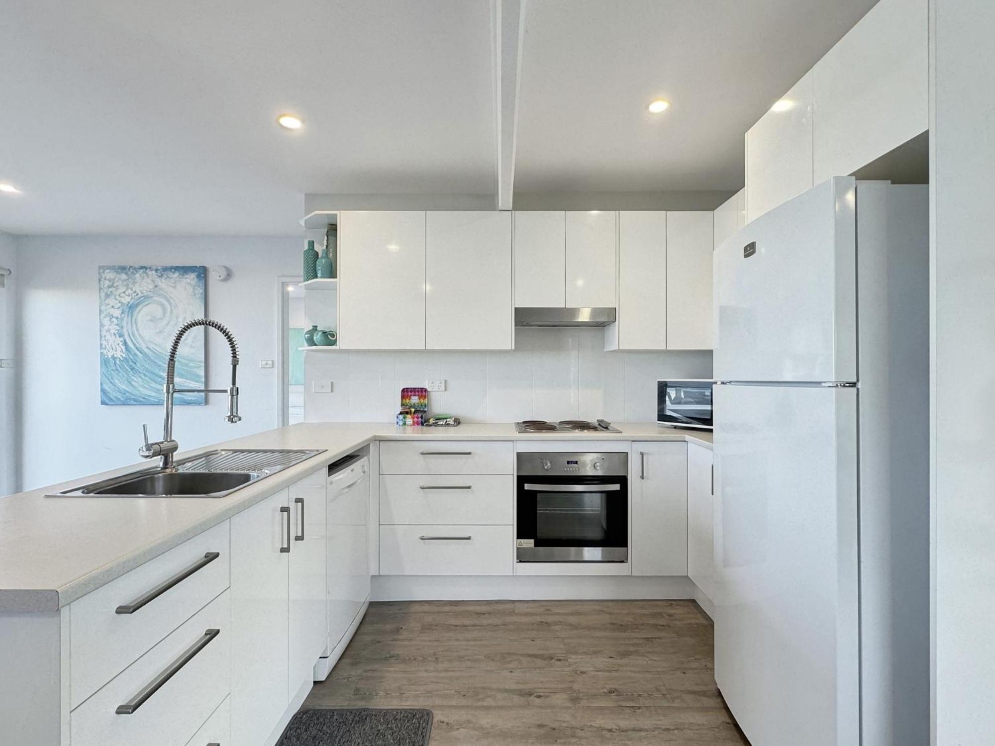 Oceanfront 4-Bed Haven with BBQ & Alfresco Dining