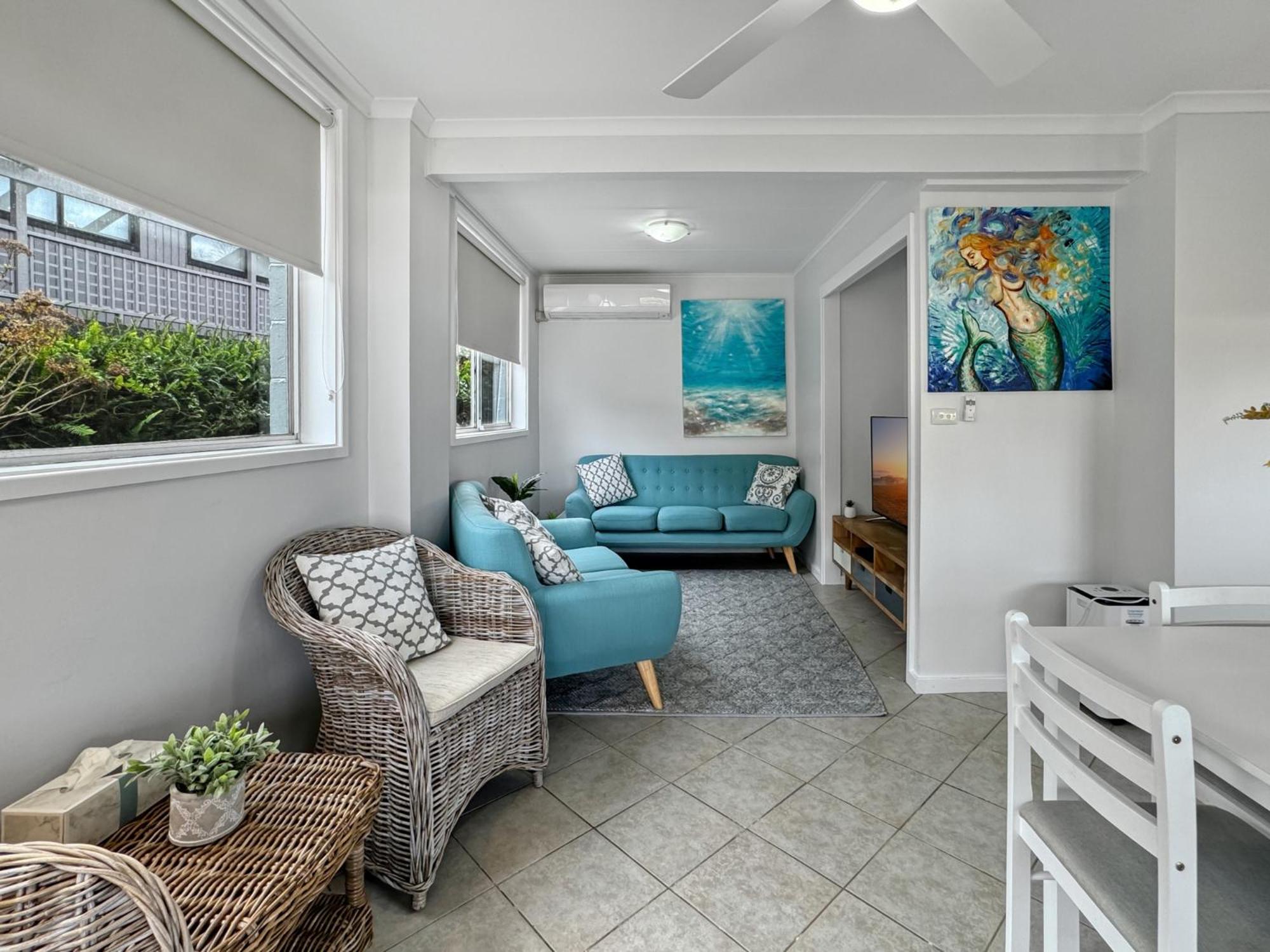 Oceanfront 4-Bed Haven with BBQ & Alfresco Dining