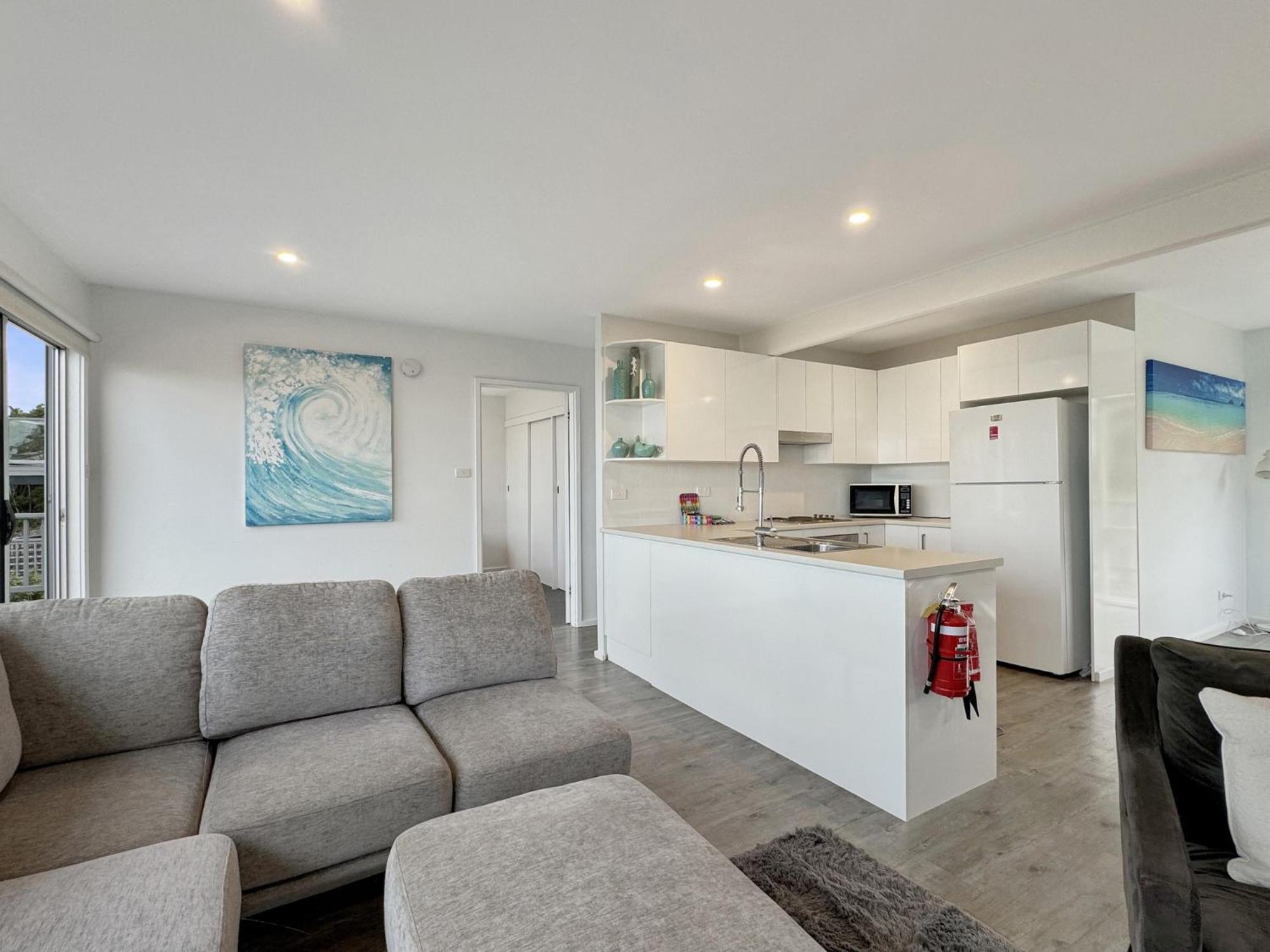 Oceanfront 4-Bed Haven with BBQ & Alfresco Dining