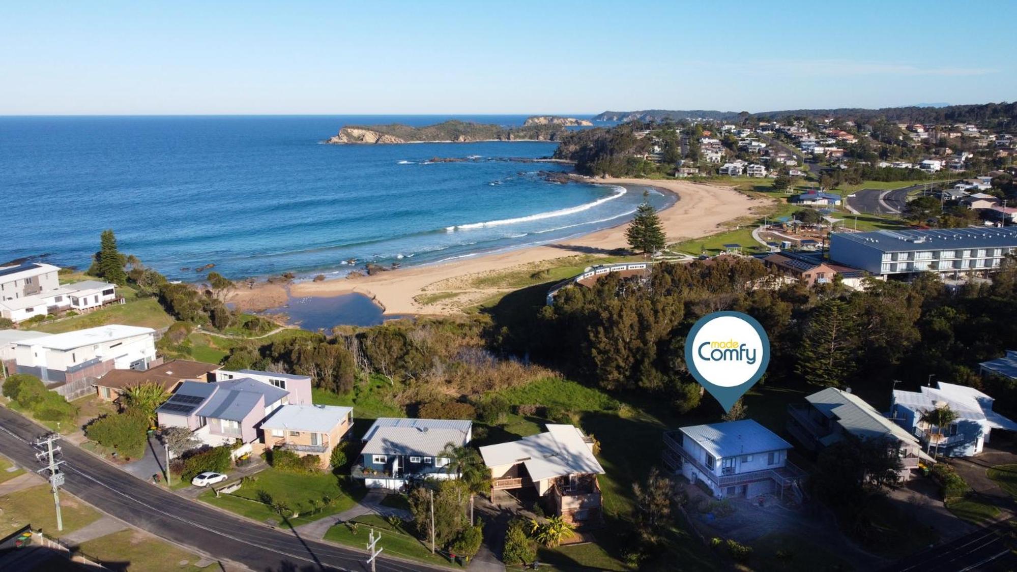 Oceanfront 4-Bed Haven with BBQ & Alfresco Dining