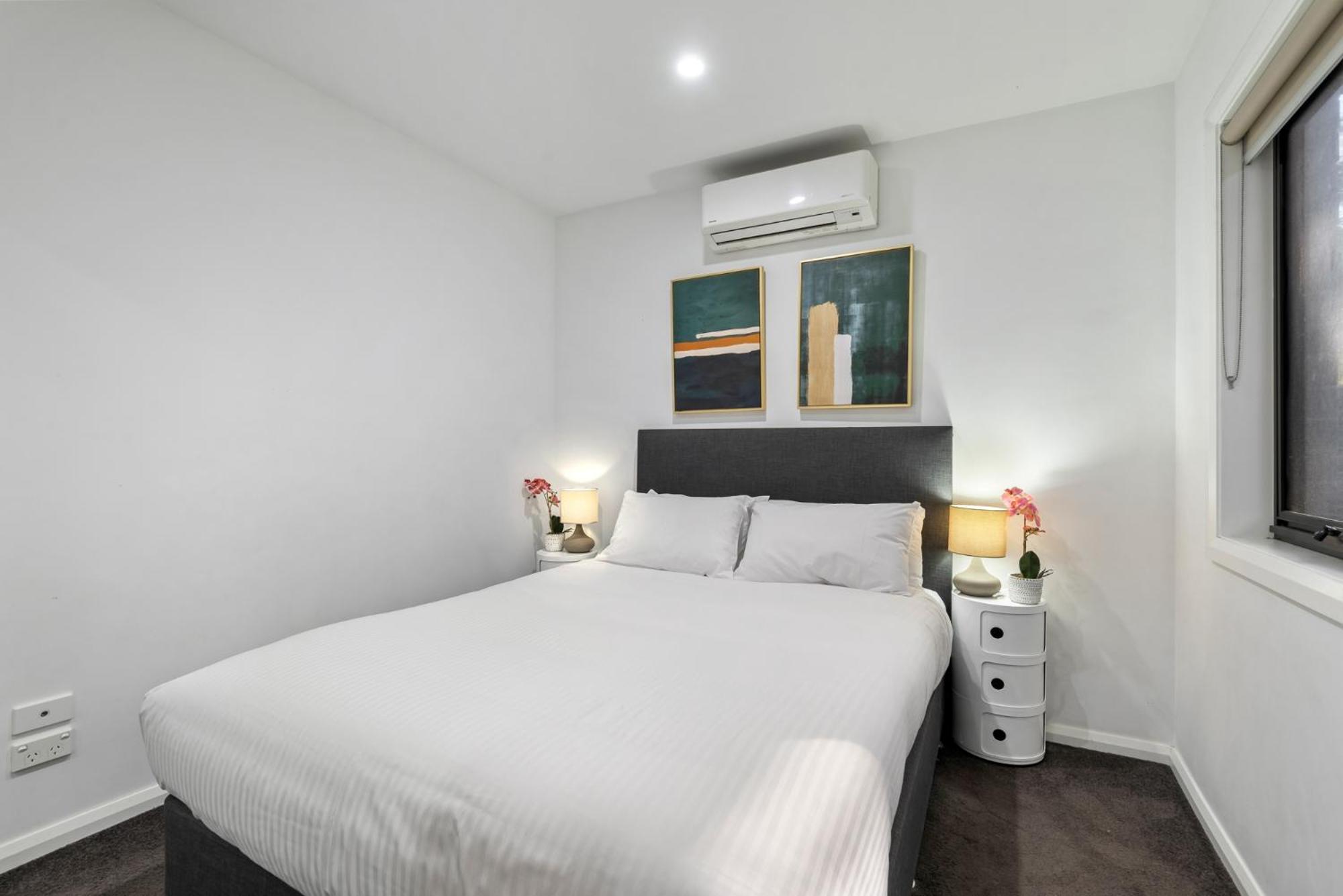 Comfortable 2BR Retreat with Balcony & Parking