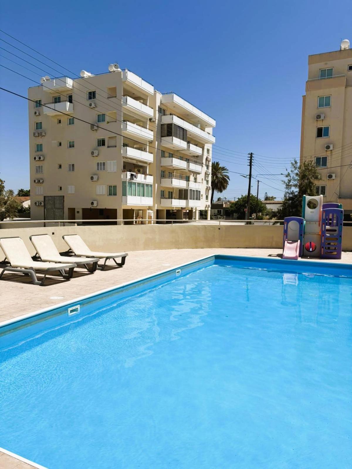 2BR Amalfi Blue Apt in Larnaca - Pool & 10Min Walk to Mackenzie Beach!