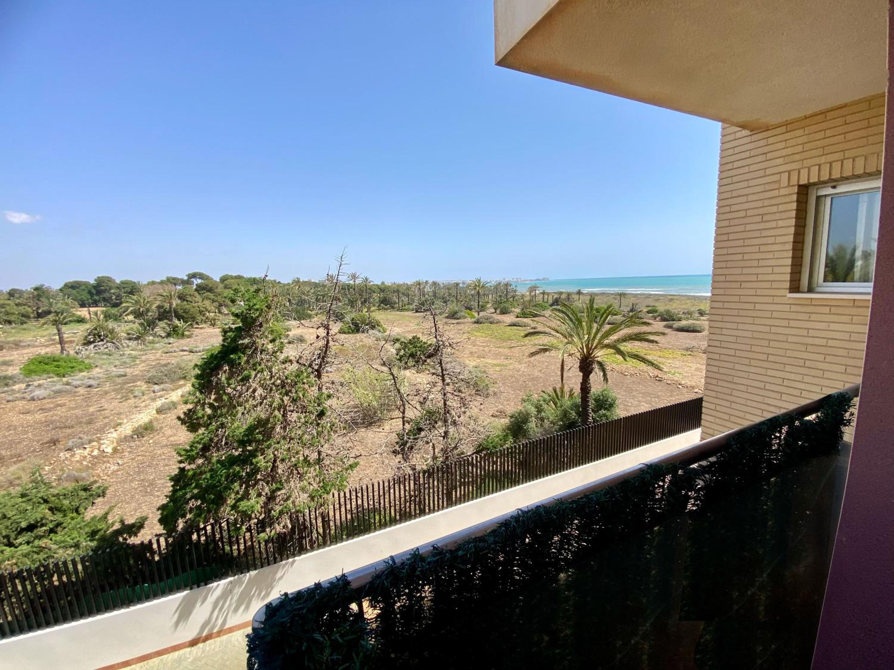 Peaceful Apartment with Sea & Nature Views, Terrace, Pool and Garage