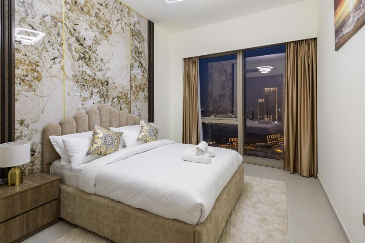 Grande 2BR Apartment with Burj Khalifa & Fountain Views