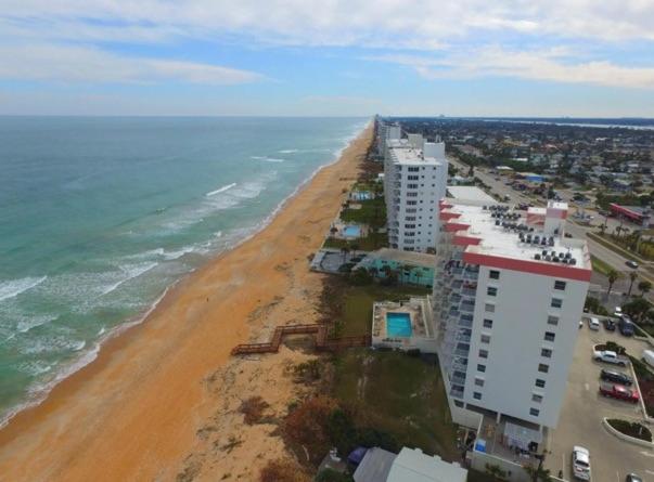 Direct oceanfront corner condo with spacious balcony and heated beachfront pool