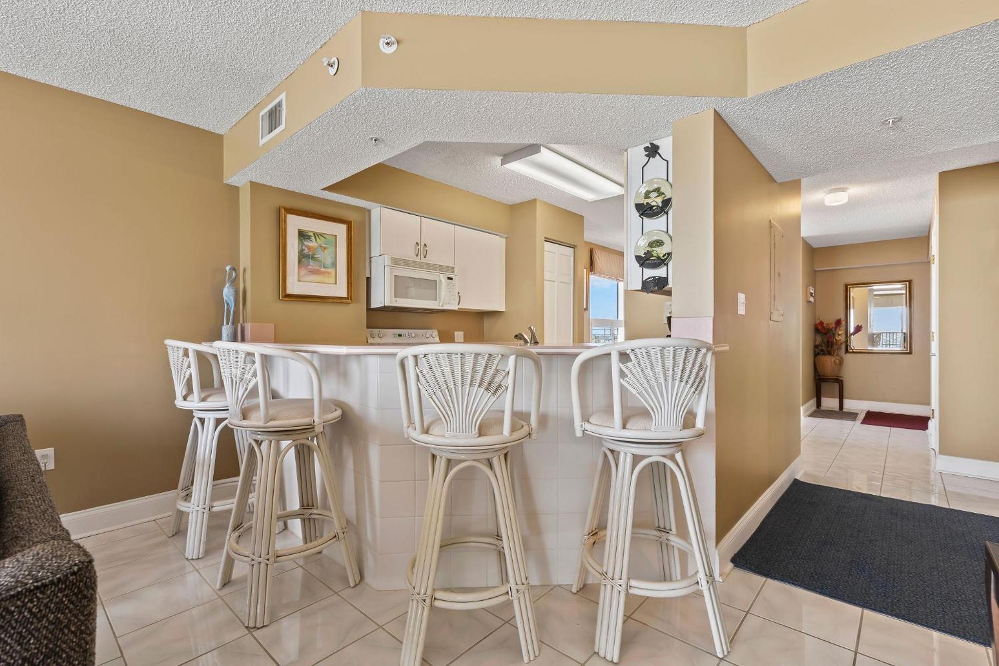 Direct oceanfront corner condo with spacious balcony and heated beachfront pool