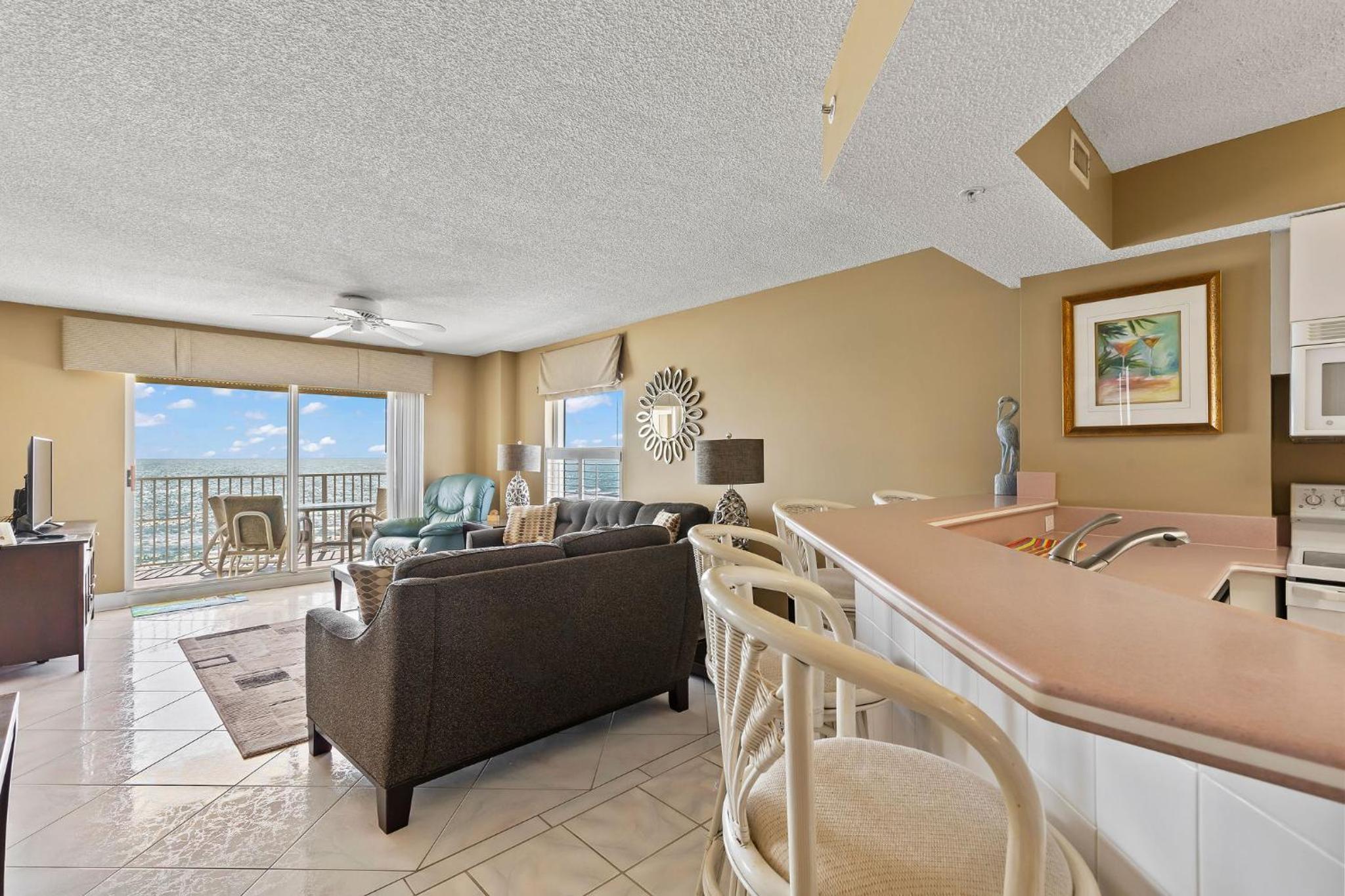 Direct oceanfront corner condo with spacious balcony and heated beachfront pool