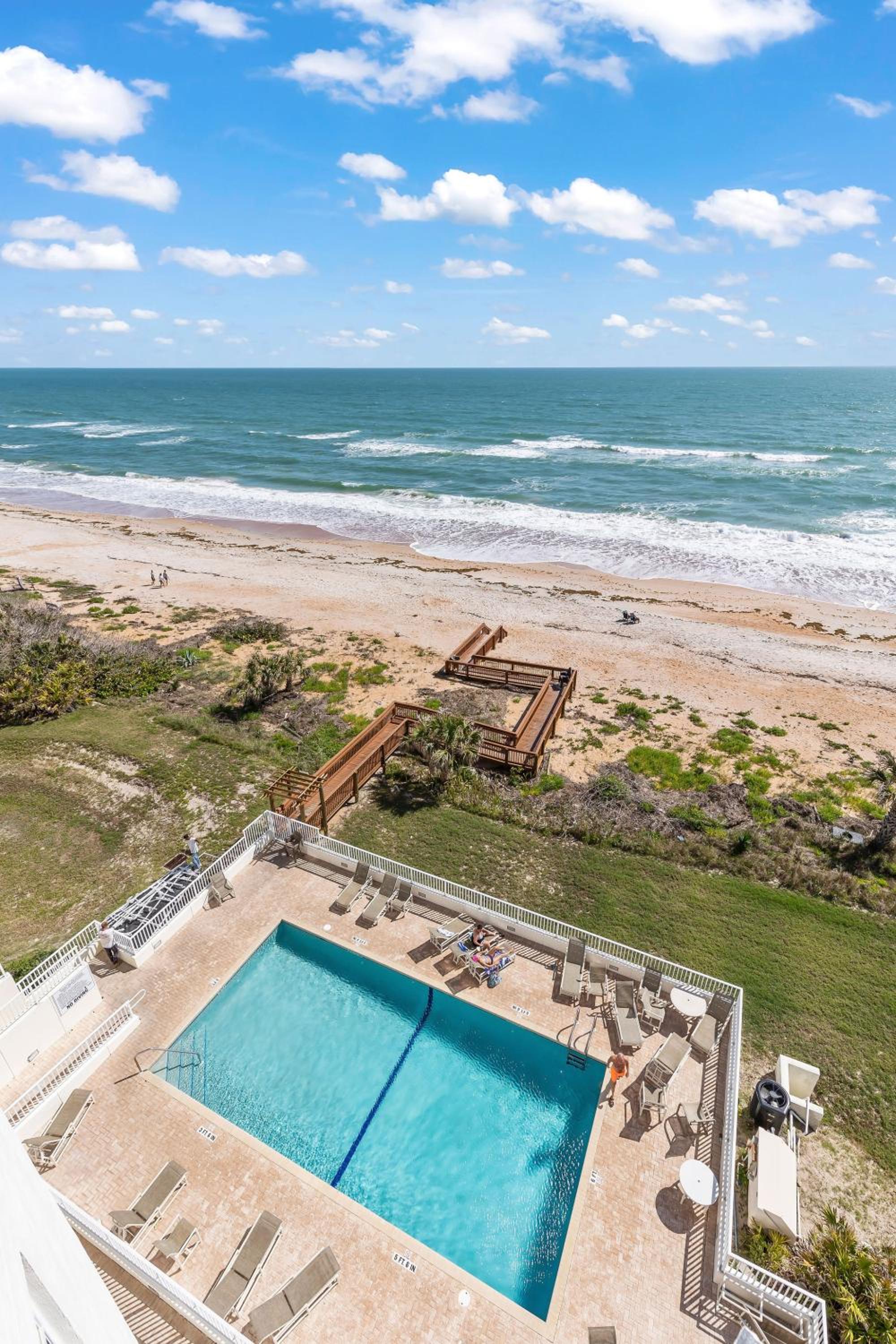 Direct oceanfront corner condo with spacious balcony and heated beachfront pool