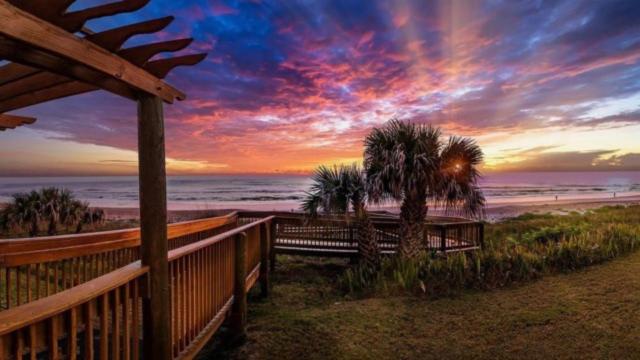 Direct oceanfront corner condo with spacious balcony and heated beachfront pool