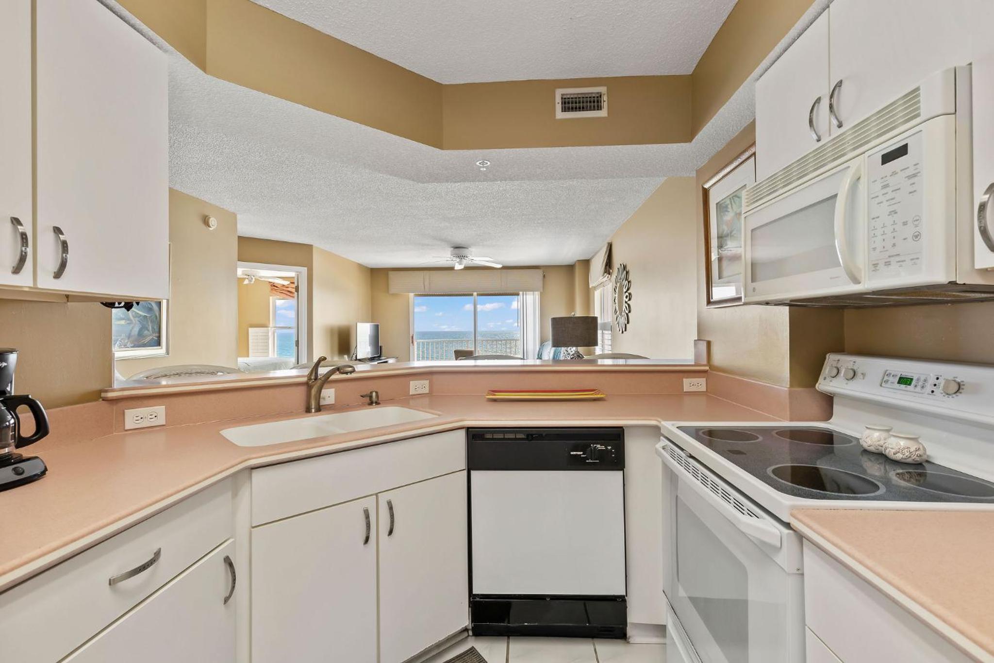 Direct oceanfront corner condo with spacious balcony and heated beachfront pool