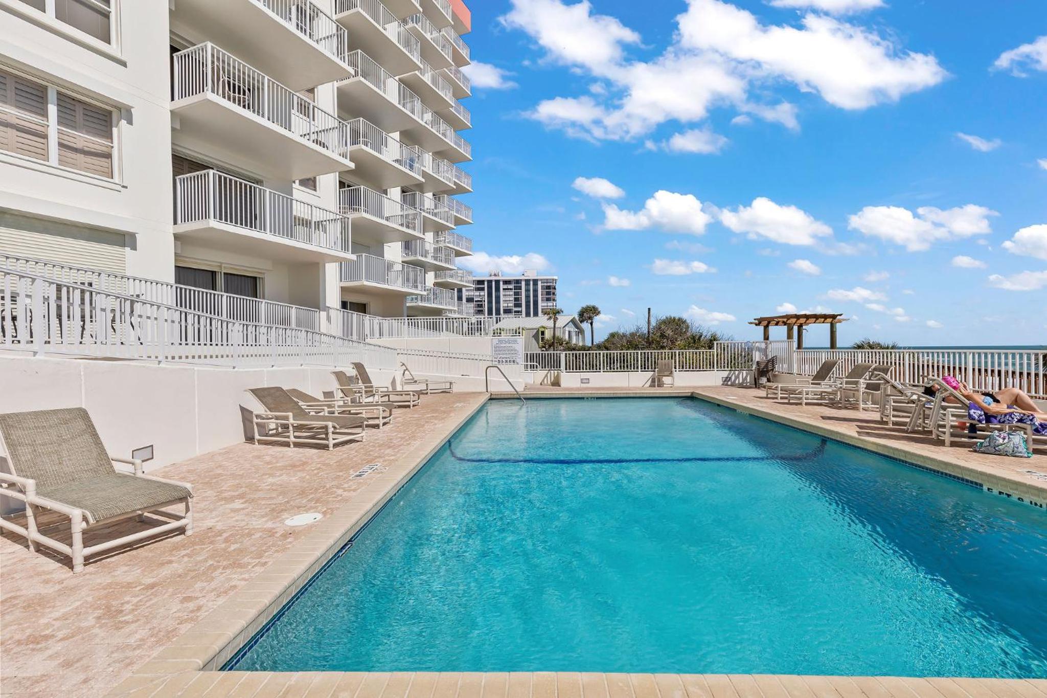 Direct oceanfront corner condo with spacious balcony and heated beachfront pool