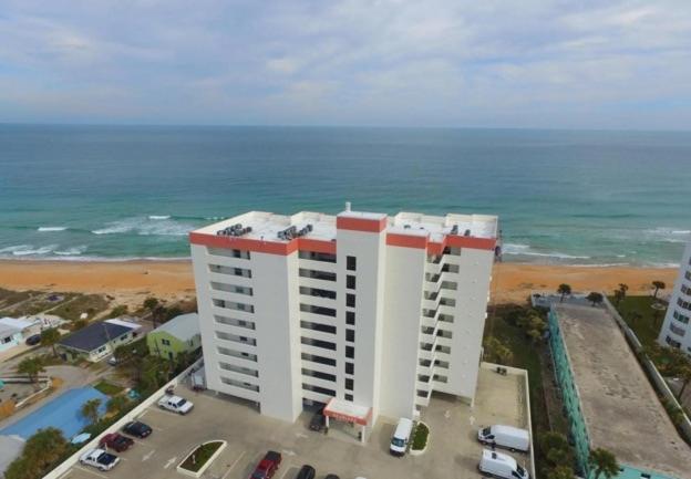 Direct oceanfront corner condo with spacious balcony and heated beachfront pool