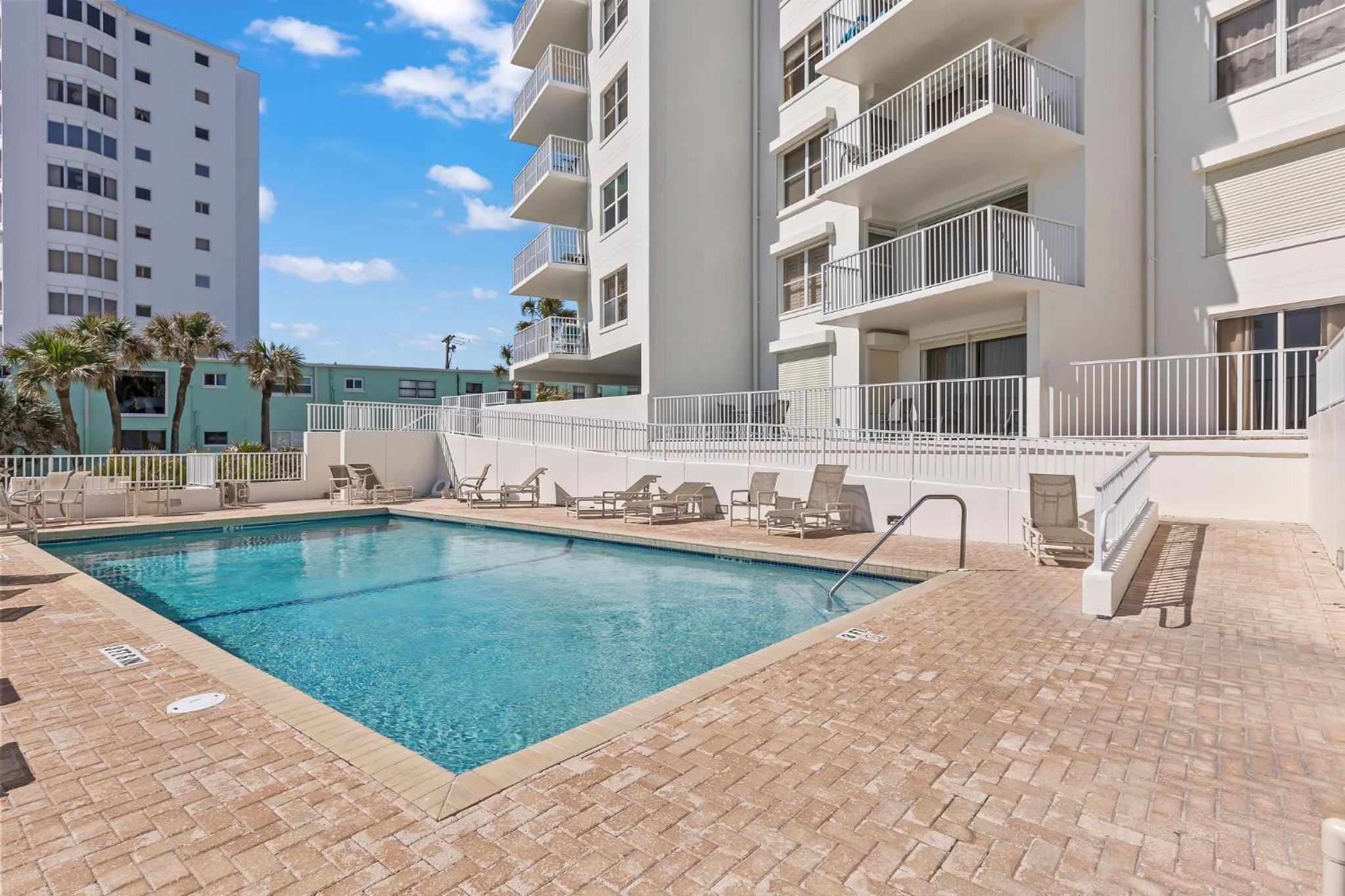Direct oceanfront corner condo with spacious balcony and heated beachfront pool