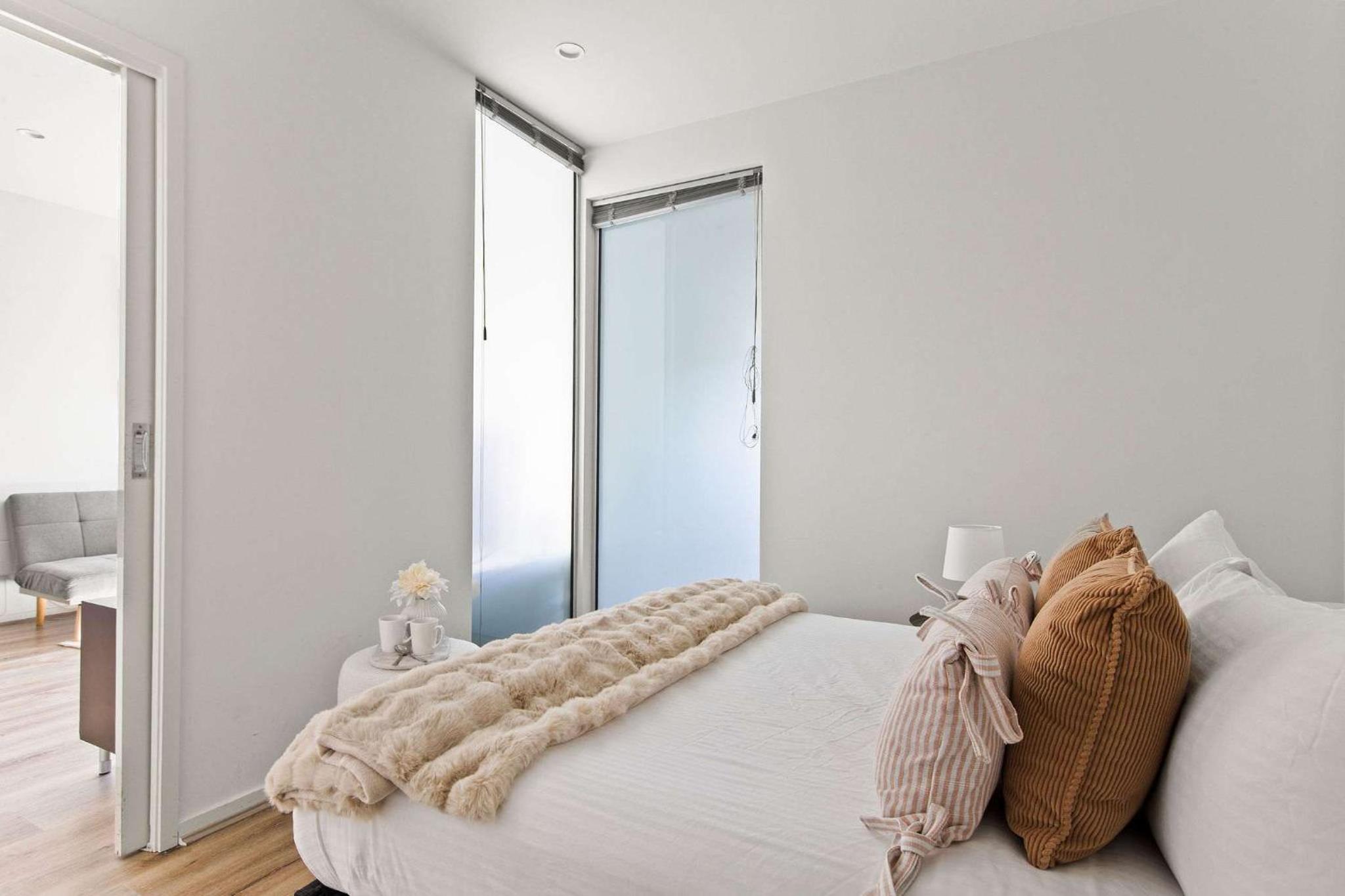 Stylish 2BR Apt Steps from Vic Market with Parking