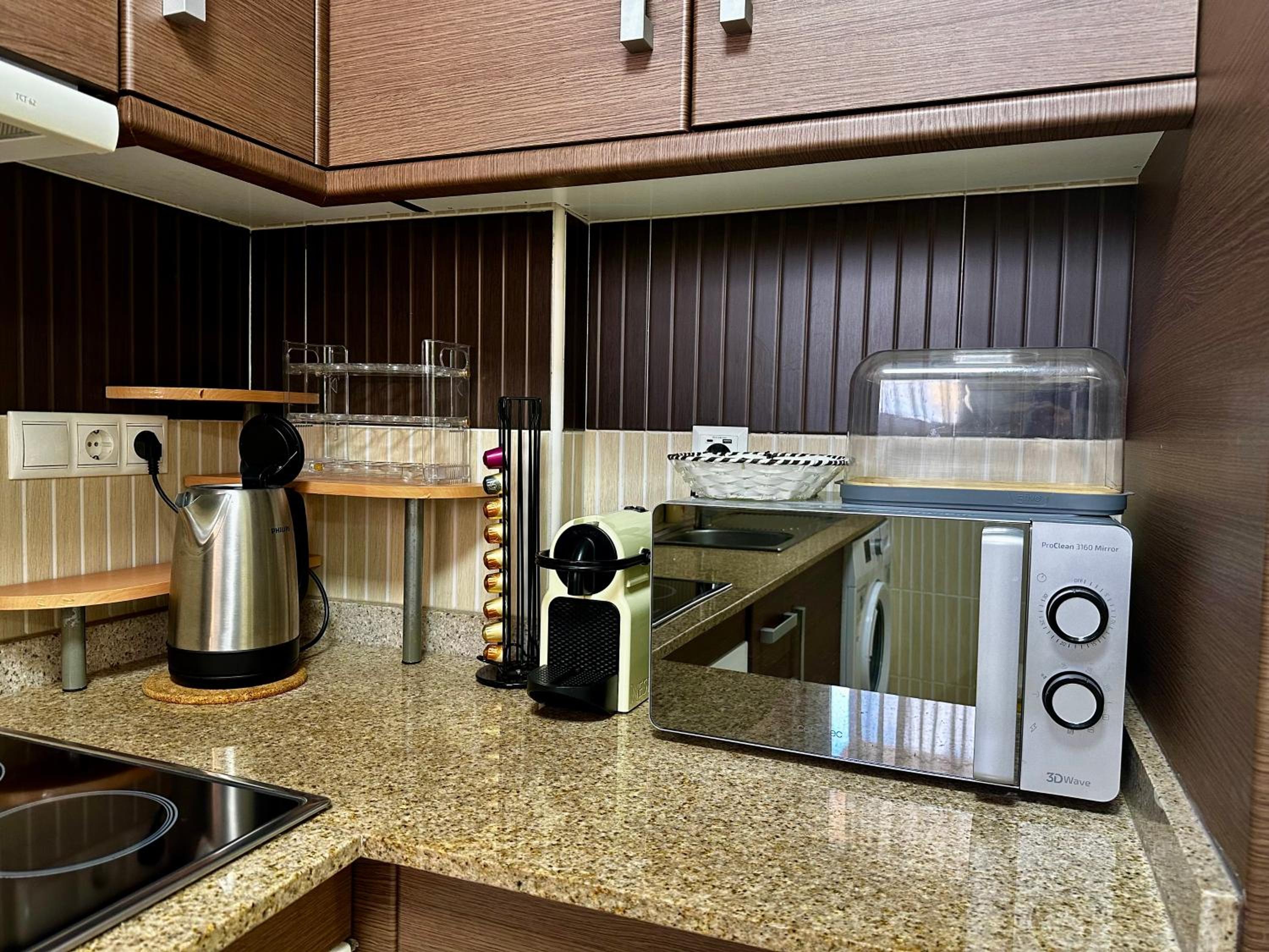Peaceful Apartment with Sea & Nature Views, Terrace, Pool and Garage