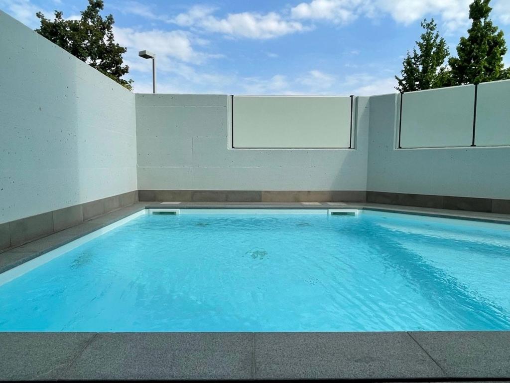 Appartamento in città con Giardino e Piscina privati