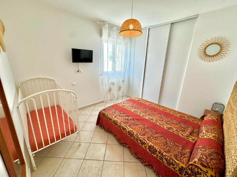 Gite en 3 épis de plain-pied, 2 chambres, climatisé, terrasse, jardinet et parking, très calme