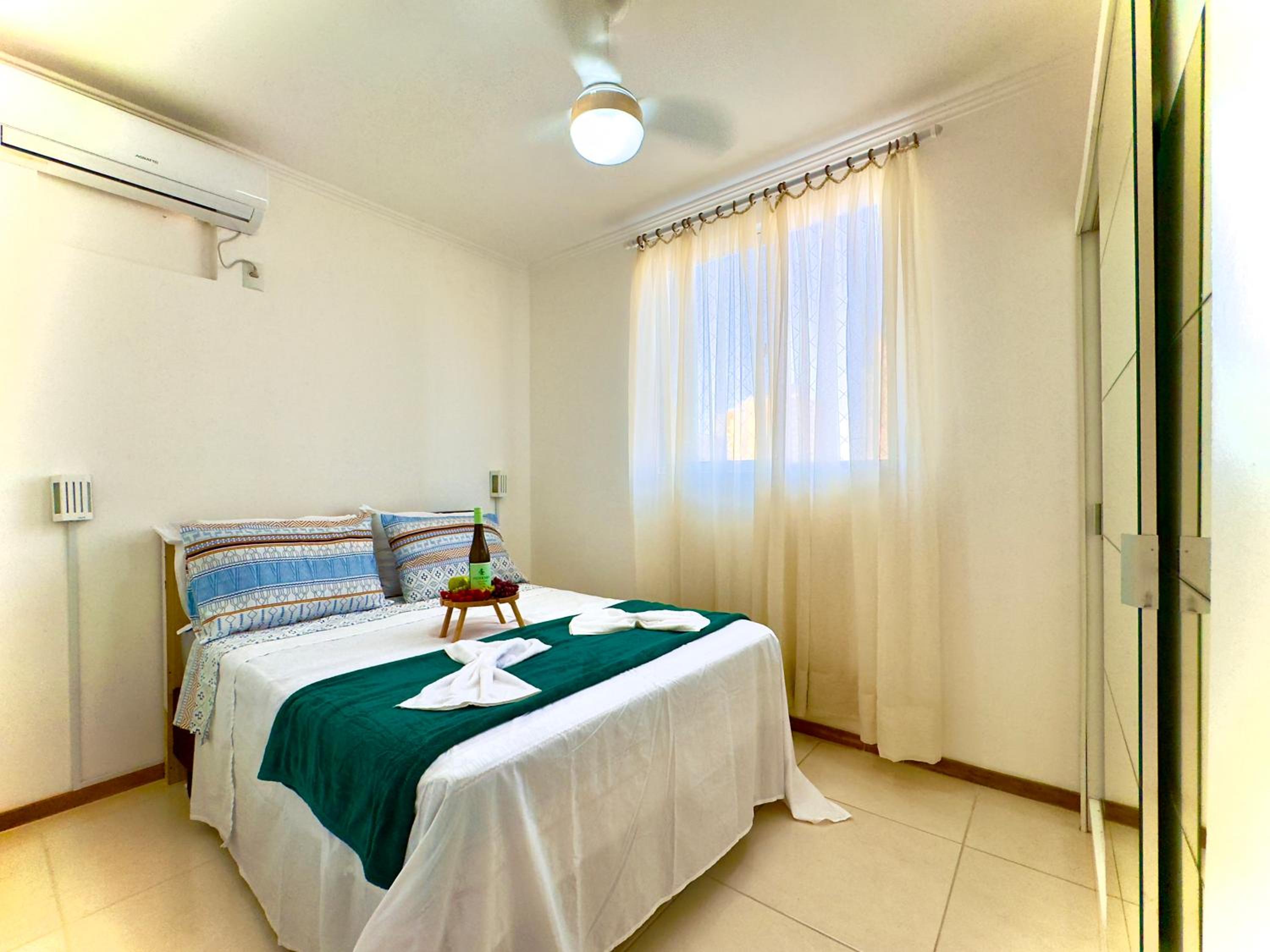 Apartamento a 400M PRAIA com PISCINA sacada com CHURRASQUEIRA privativa Wi-Fi Portaria 24h PLAYGROUND INFANTIL Quadra de esportes e vaga privativa de GARAG
