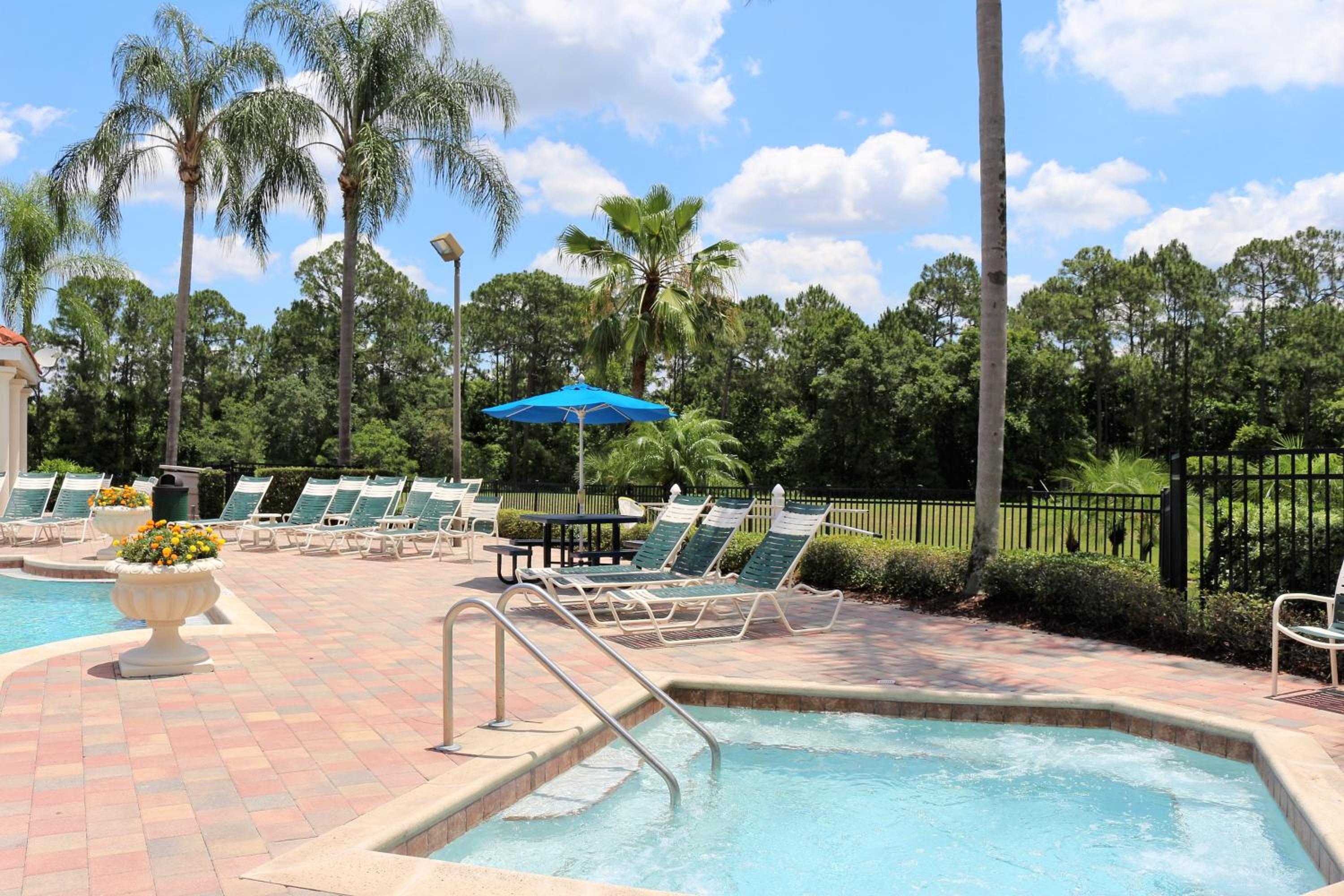 Luxury Emerald Island Resort Villa with Stunning Pool Deck and Lake View Near Disney
