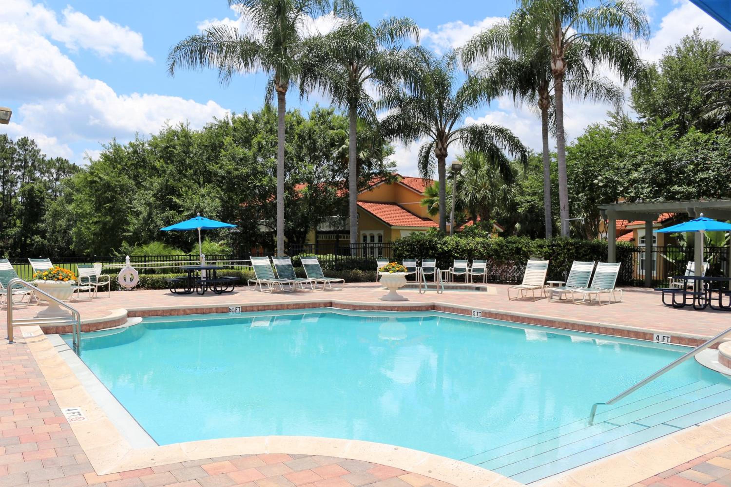 Luxury Emerald Island Resort Villa with Stunning Pool Deck and Lake View Near Disney