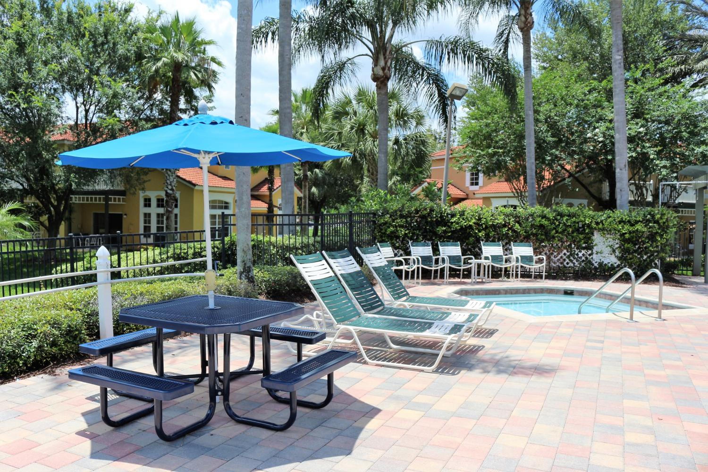 Luxury Emerald Island Resort Villa with Stunning Pool Deck and Lake View Near Disney