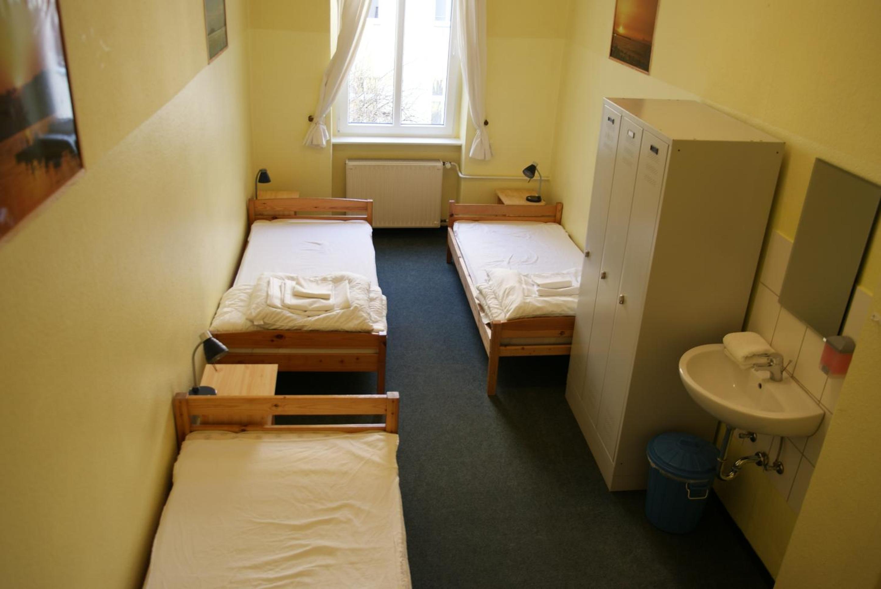 Happy Go Lucky Hotel + Hostel