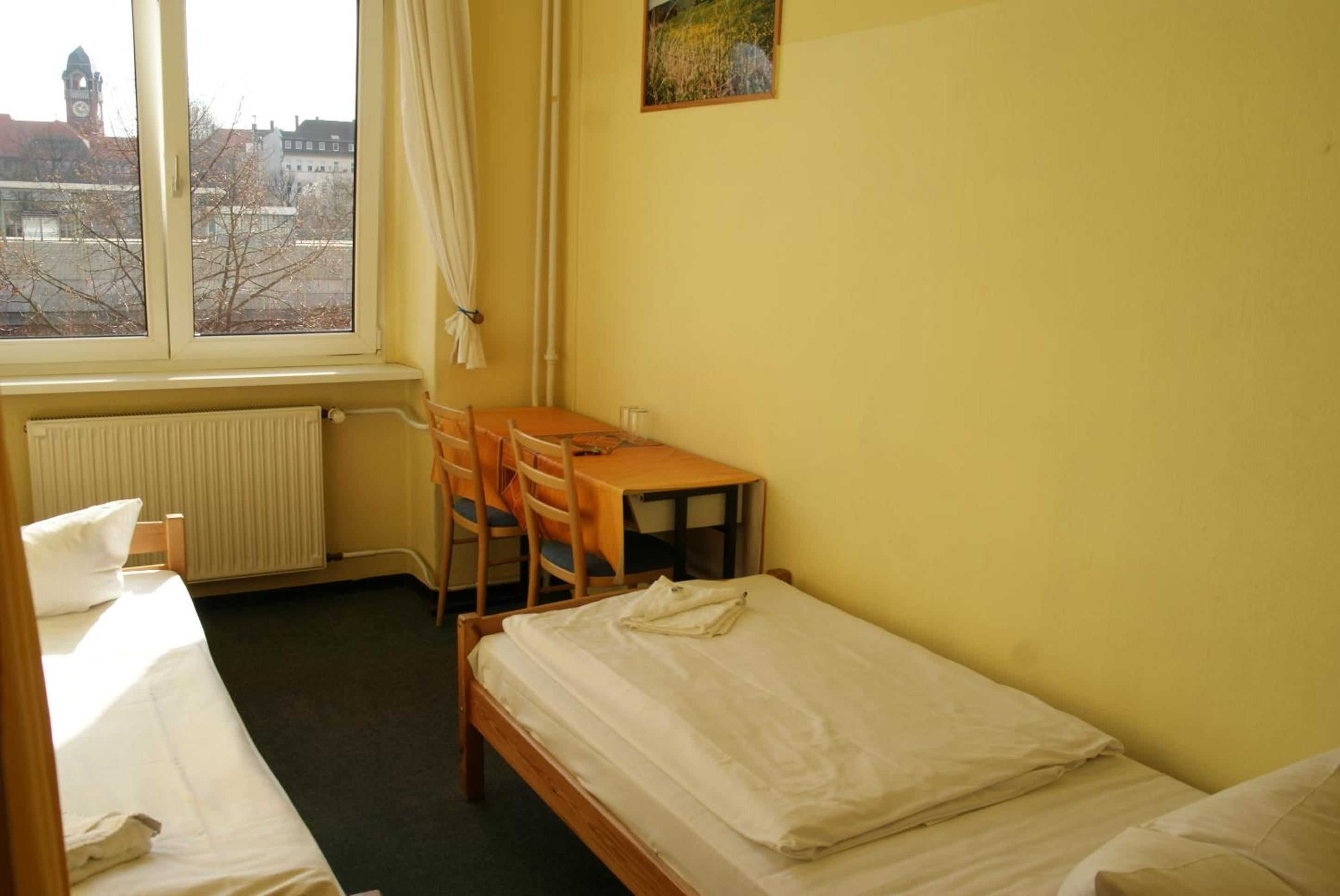 Happy Go Lucky Hotel + Hostel
