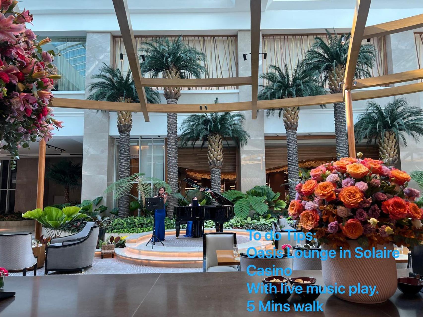 Modern 1BR with Balcony Facing Infinity Pool Manila Bay Sunset Near Airports OKADA Solaire MOA