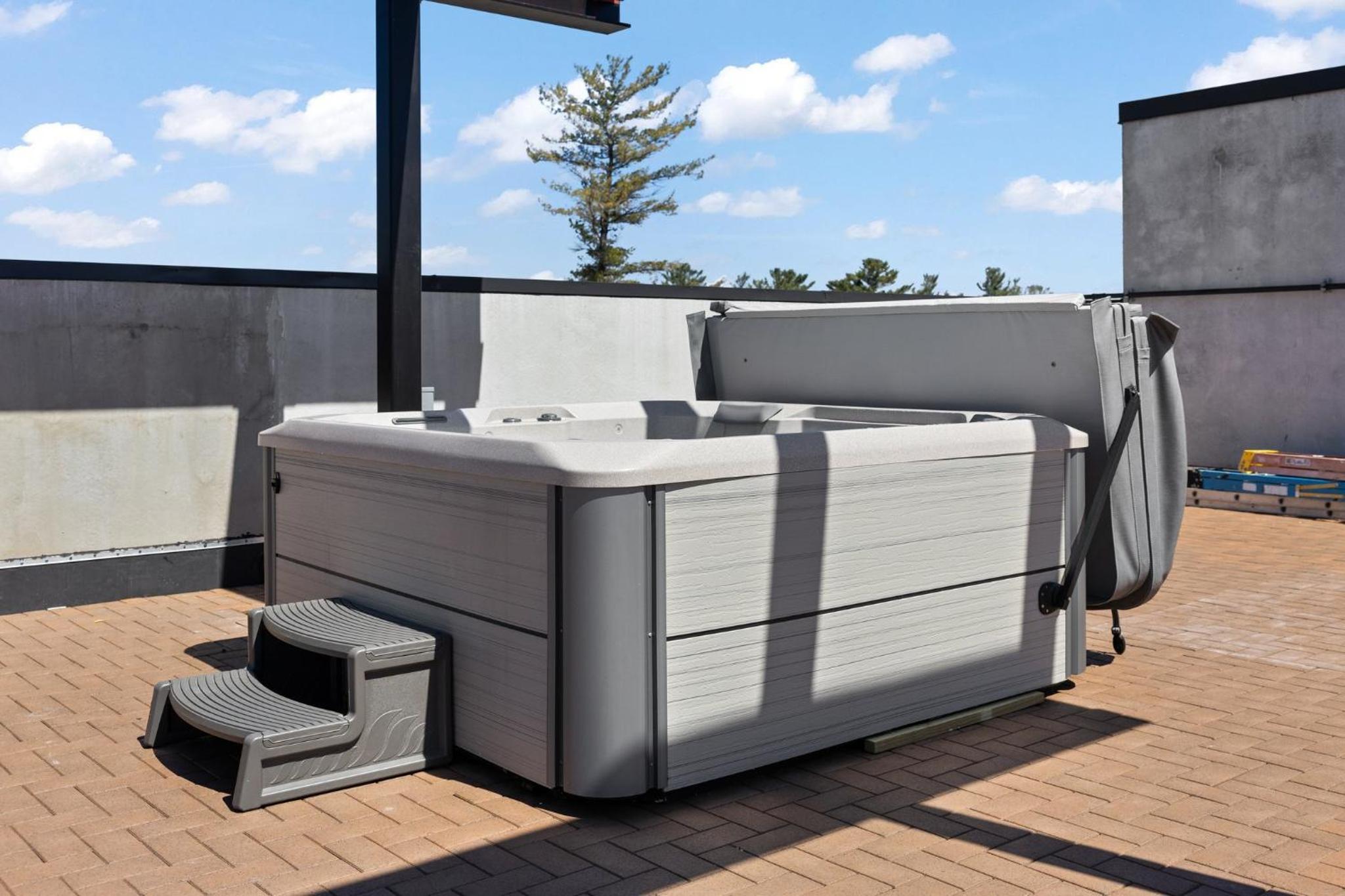 Eclectic Condo with Hot Tubs and E-Bikes