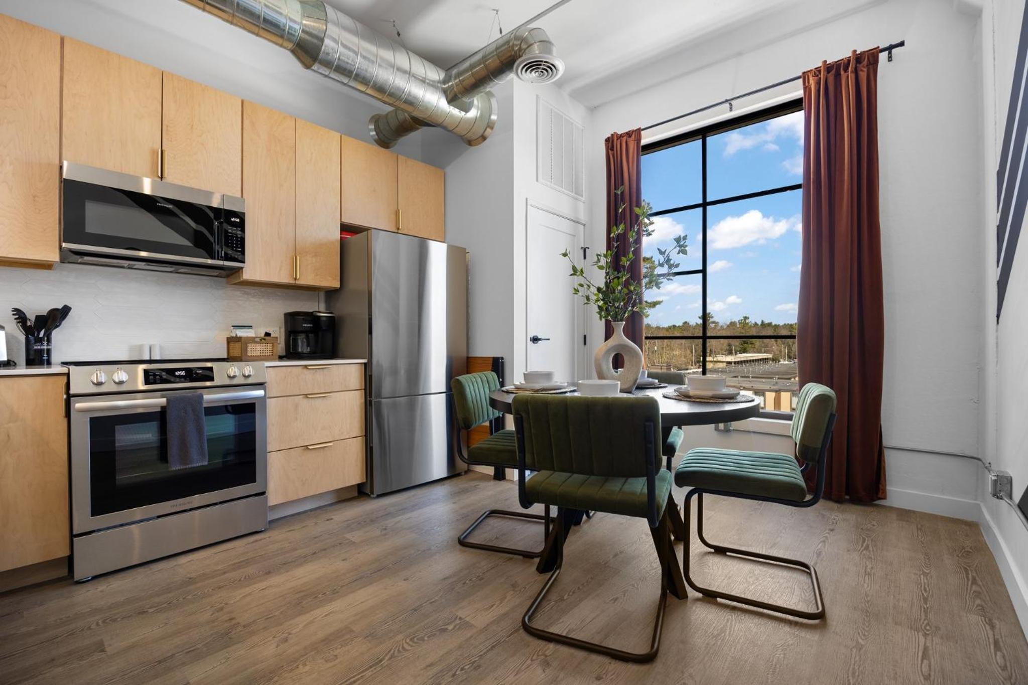 Eclectic Condo with Hot Tubs and E-Bikes
