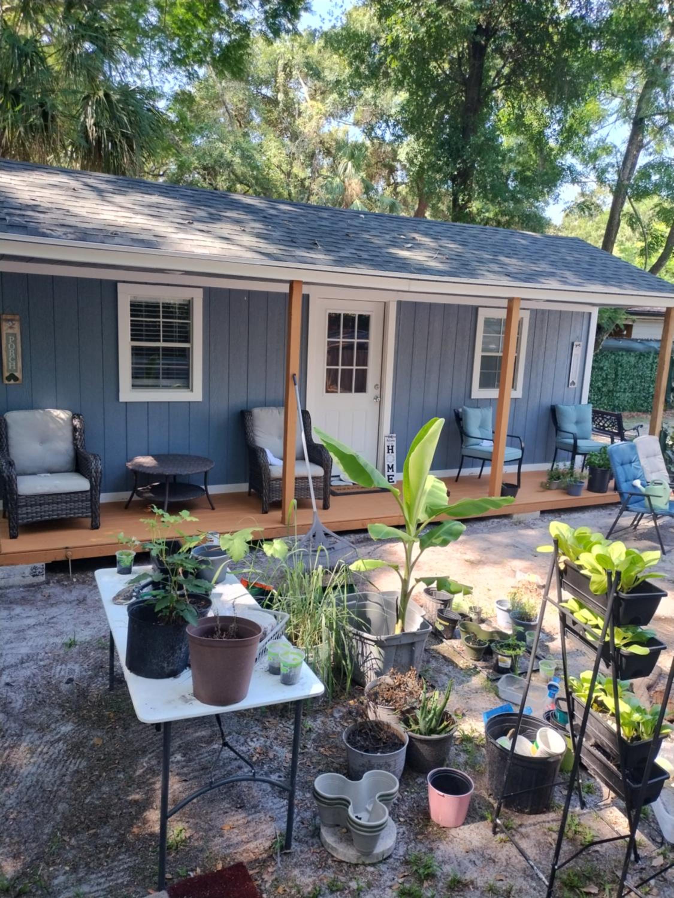 Tiny home barn style in backyard with Animals