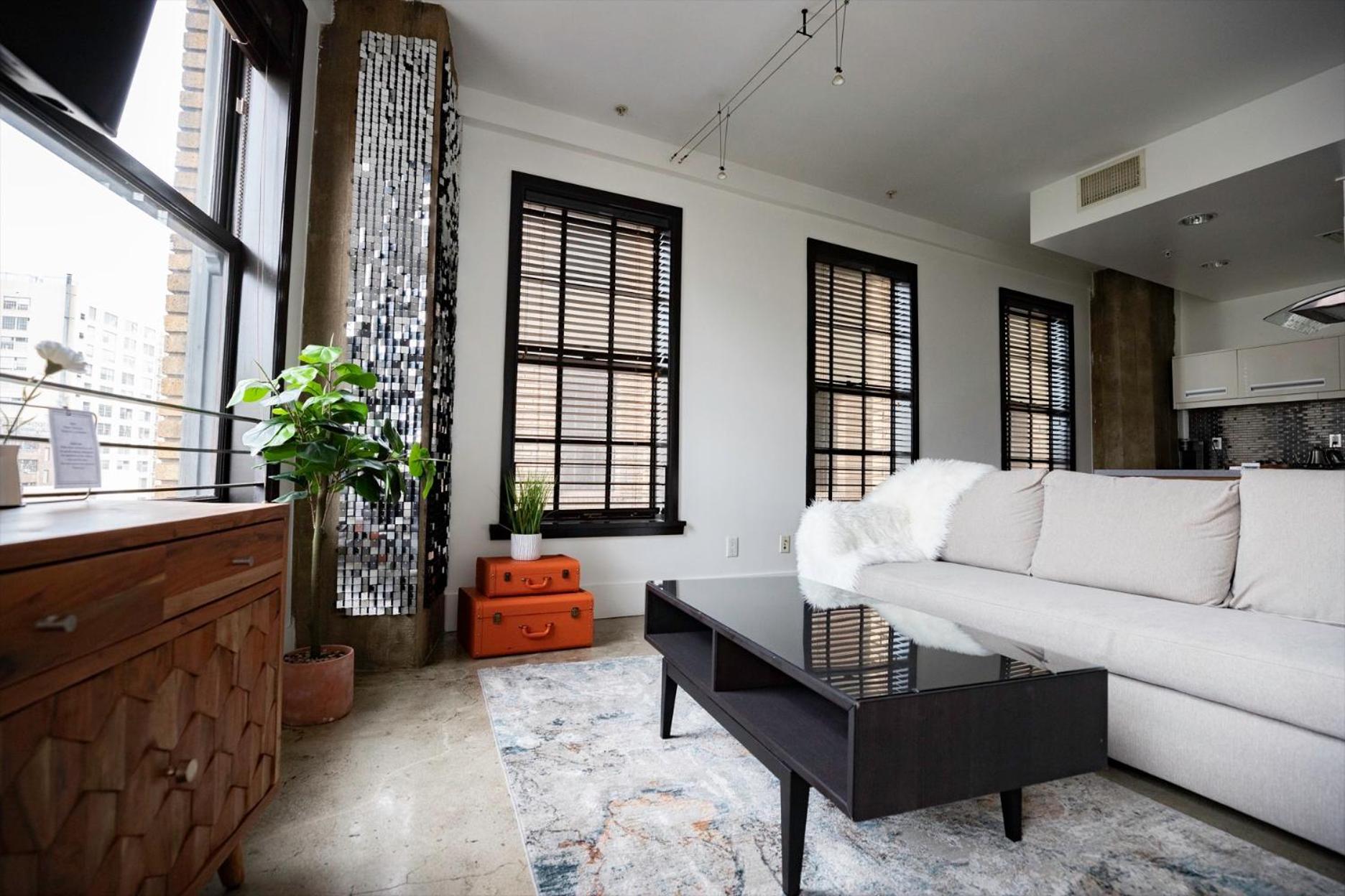 Stylish loft 2 queens & 2 sofas