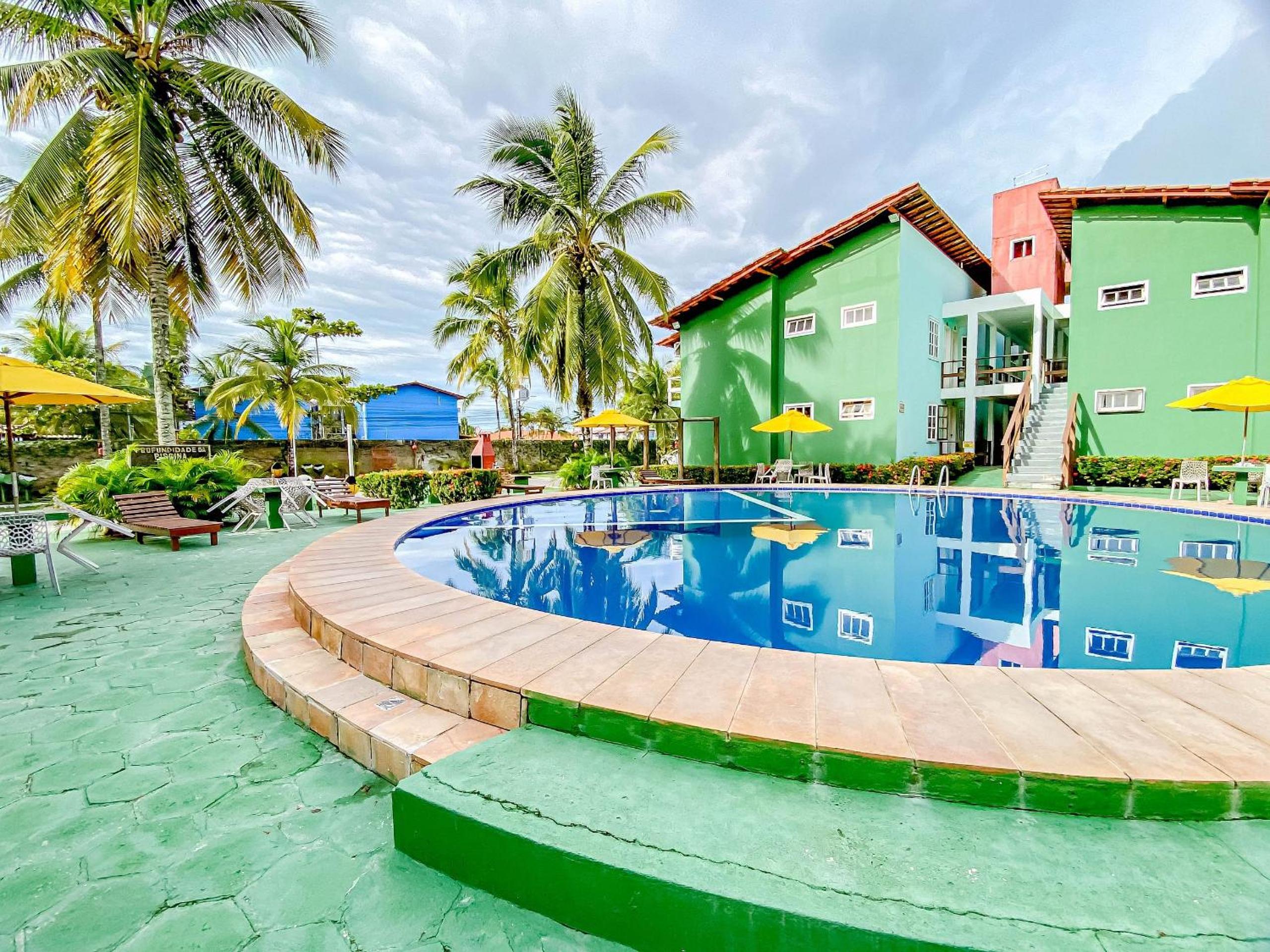 Condomínio Village Taperapuã a uma quadra do Axé Mói, com piscina, churrasqueira, portaria 24hrs, com supermercado e centro gastronômico ao lado